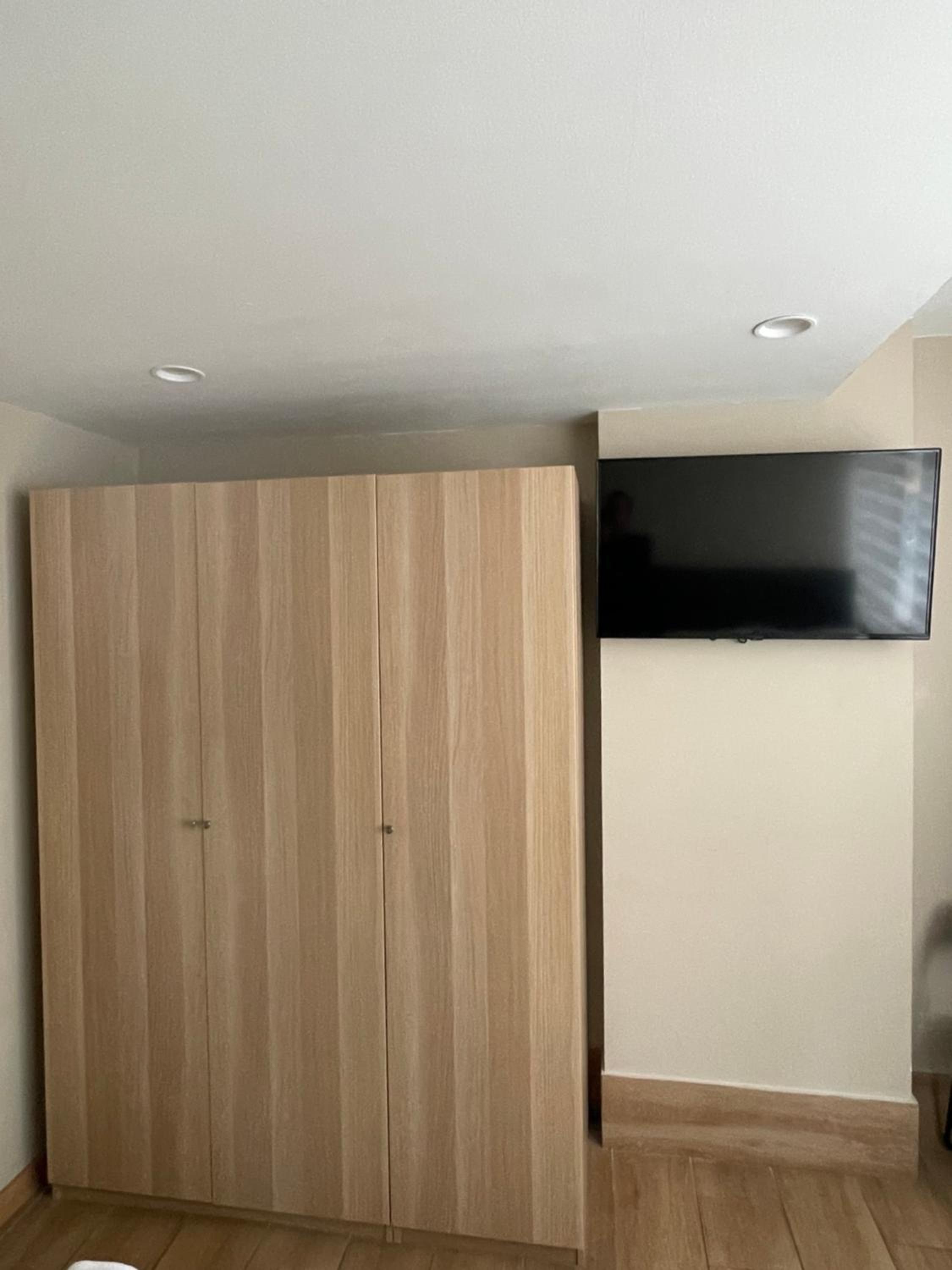 Habitación triple con baño