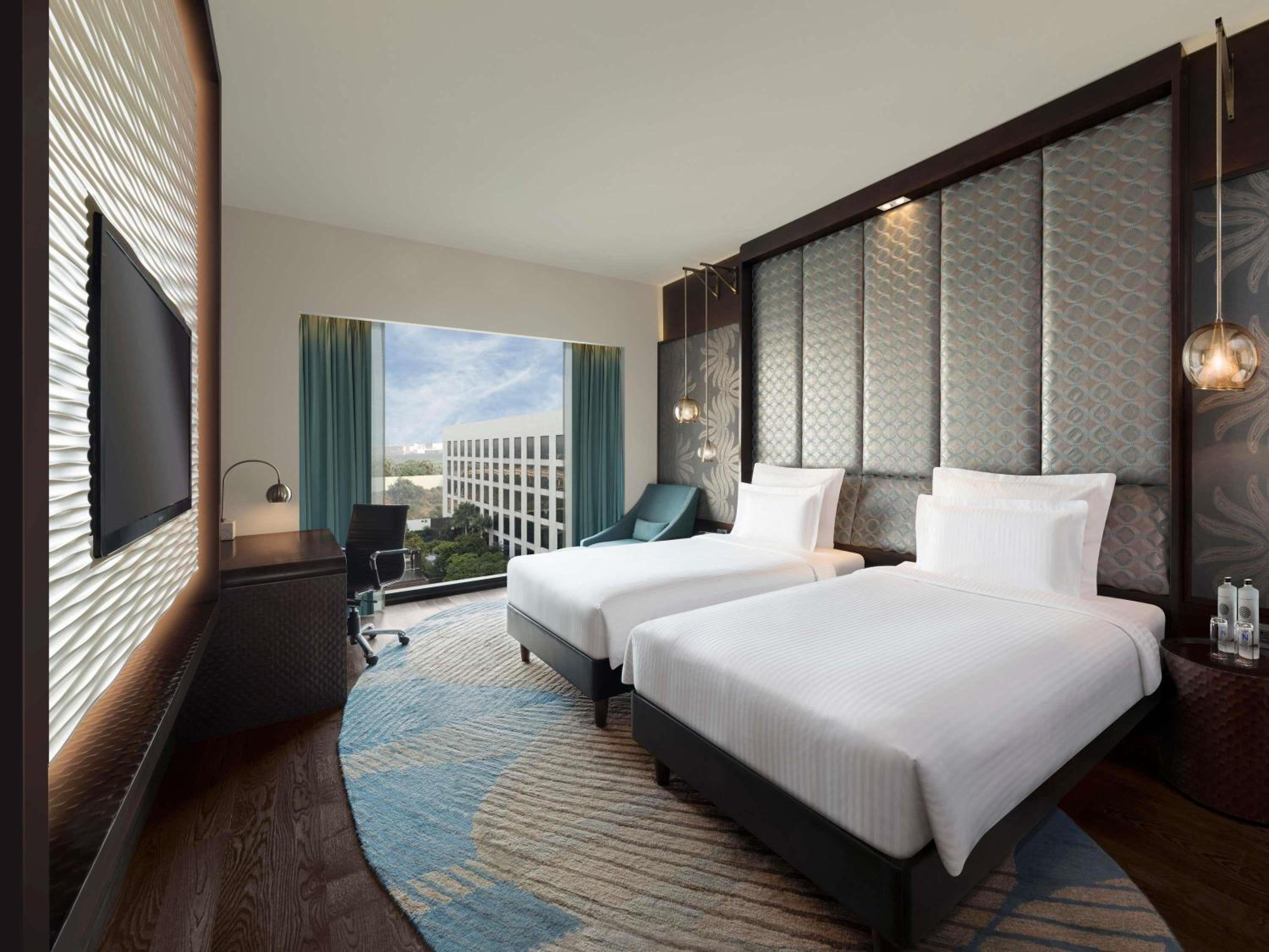 Executive Twin Room - Pool Side with 20% discount on food, beverages, spa and laundry | Complimentary one way airport transfer | Lounge access and cocktail hours