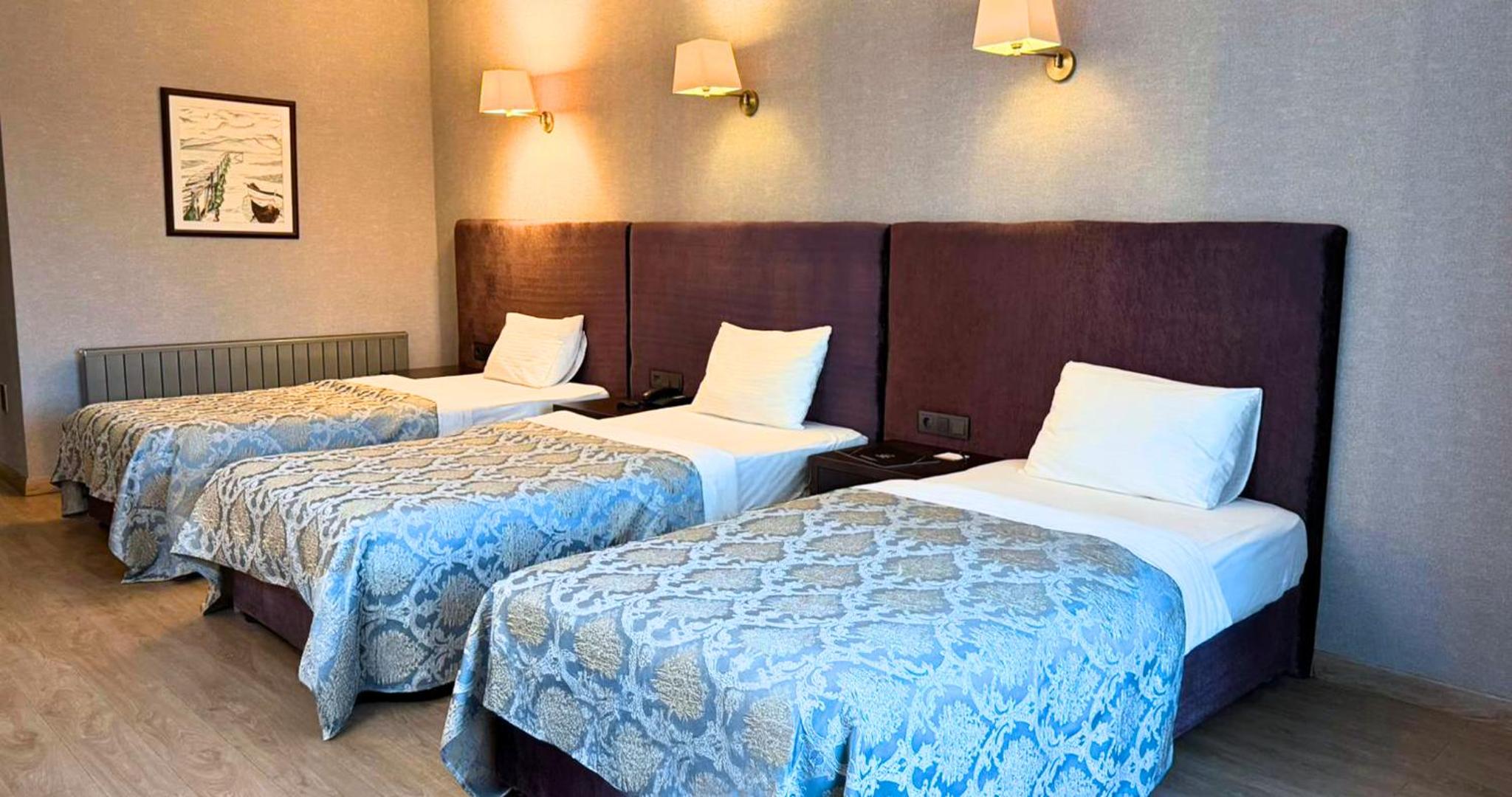 Deluxe Triple Room with Sea View photo 2