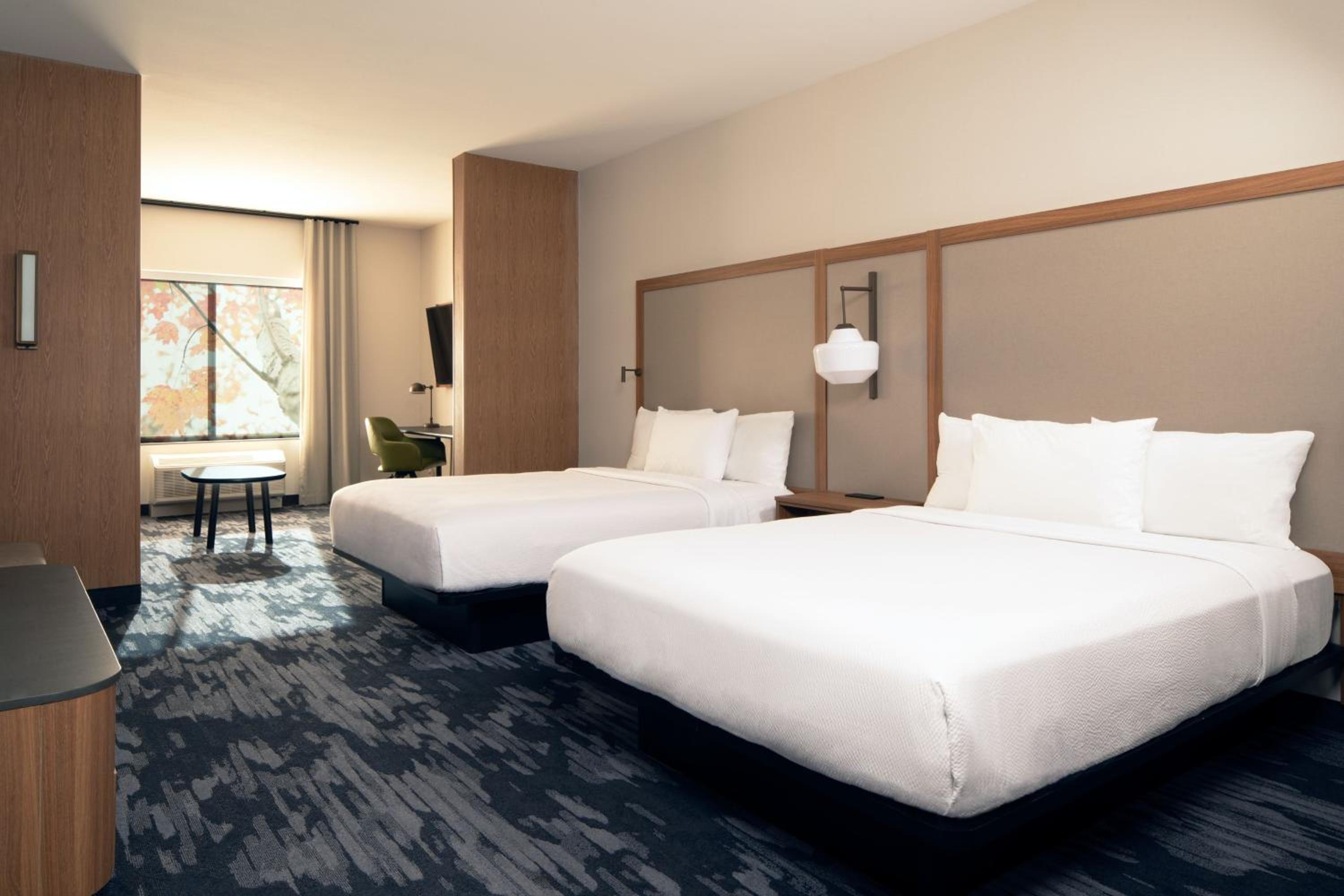 Queen Suite with Two Queen Beds, Roll-In Shower and Sofa Bed - Mobility Access