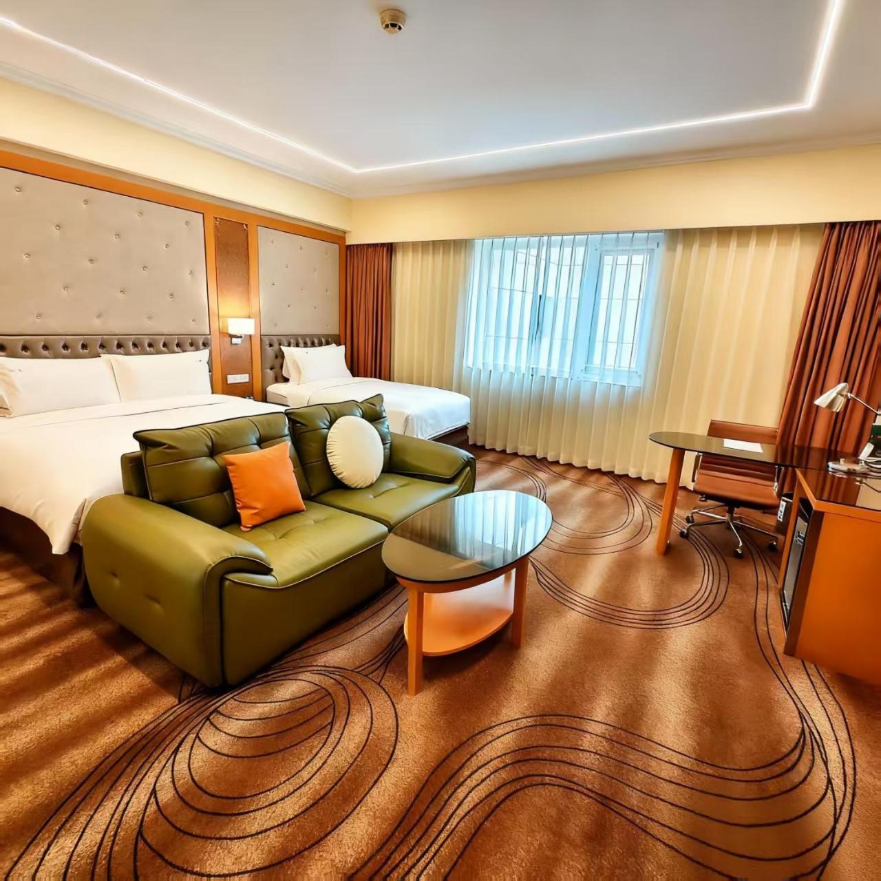 Premium King Room with One King Bed and One Single Bed - Photo 1