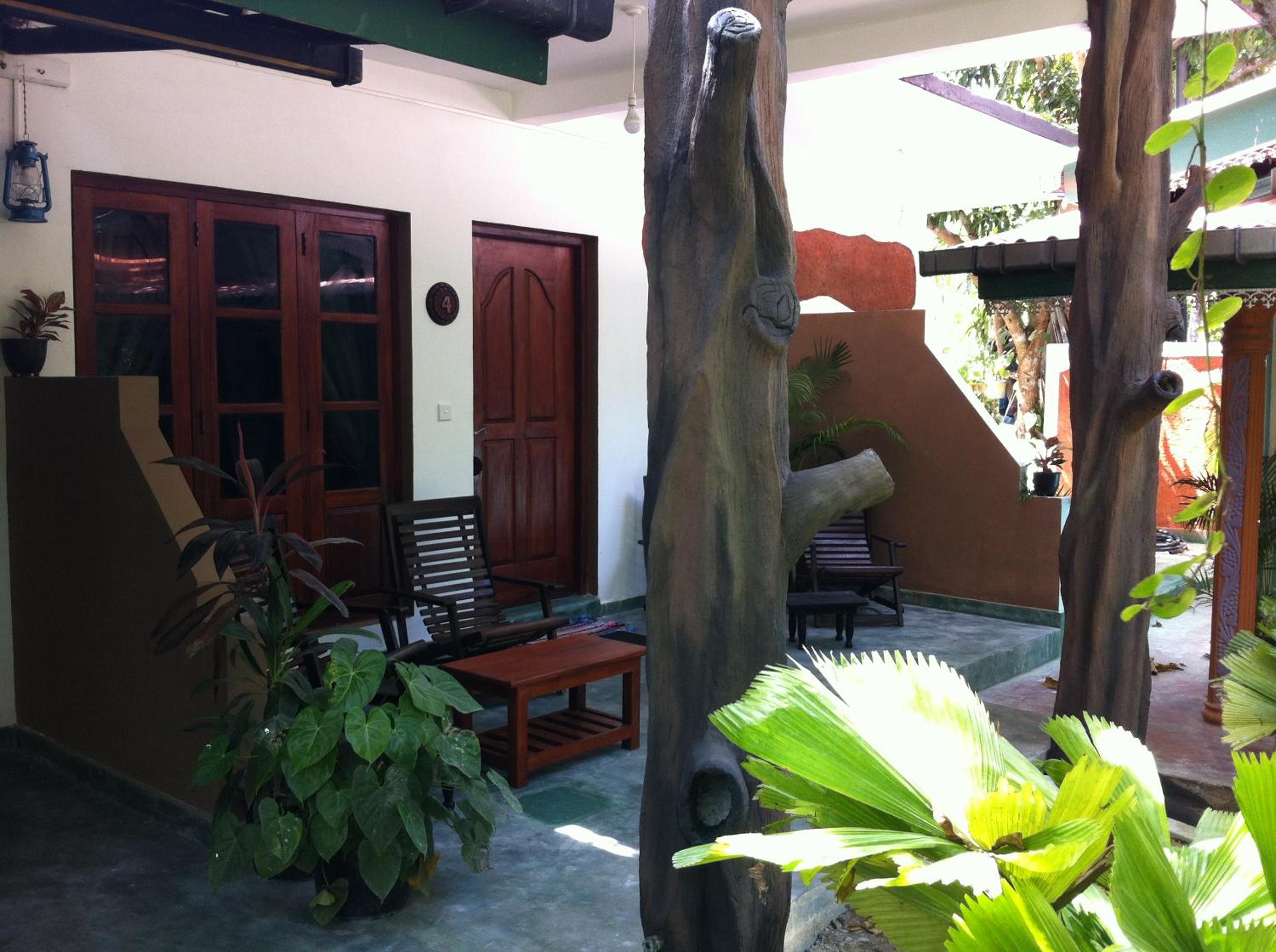 Deluxe Triple Room with Garden View photo 3