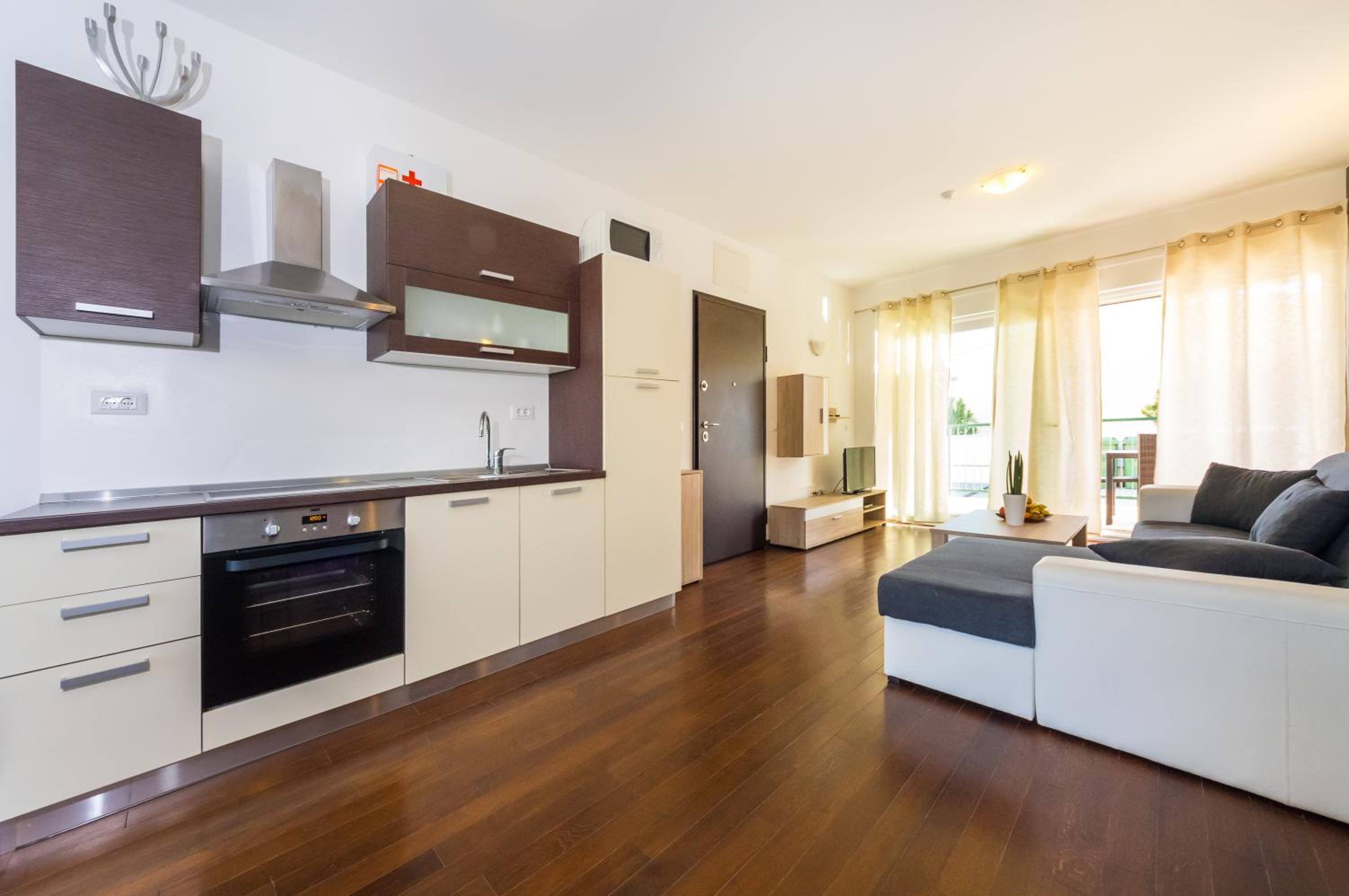 Two-Bedroom Apartment with Balcony and Garden View