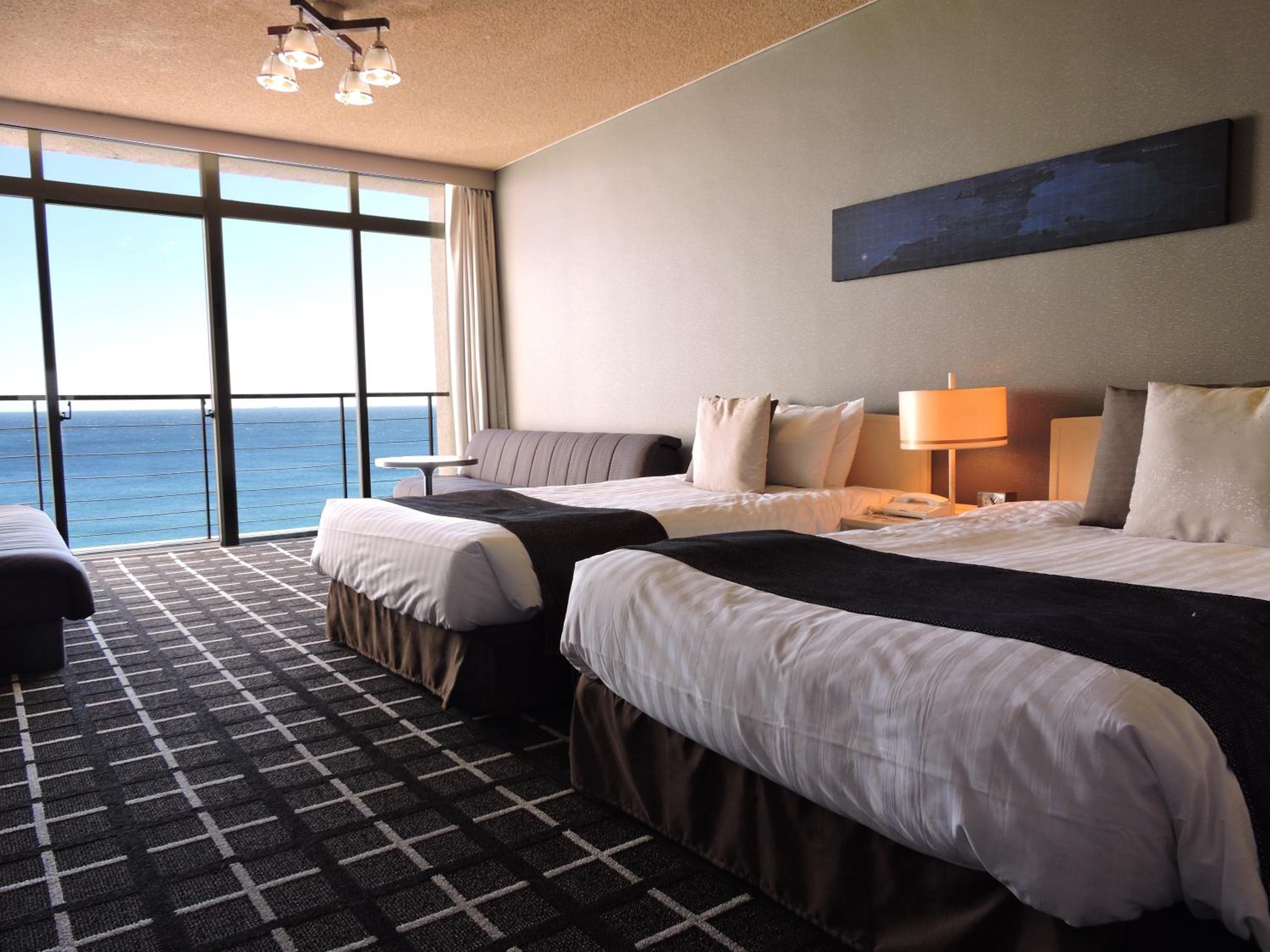 Twin Room with Sofa Bed and Sea view - Top Floor - Photo 1