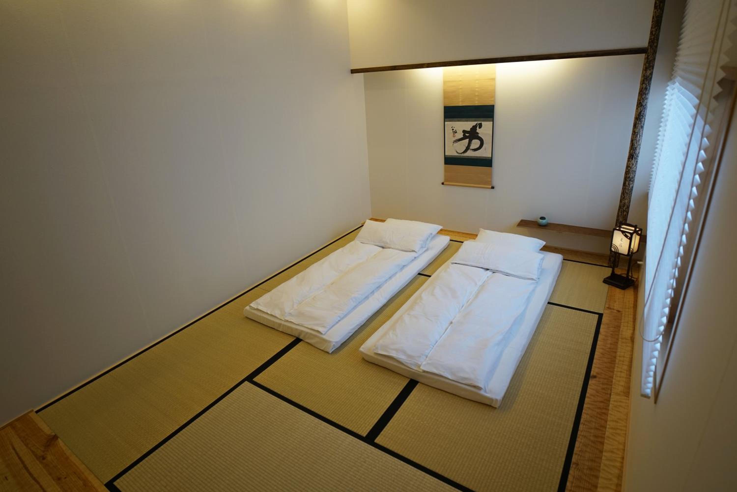日式豪华房(共用浴室及独立卫生间)
