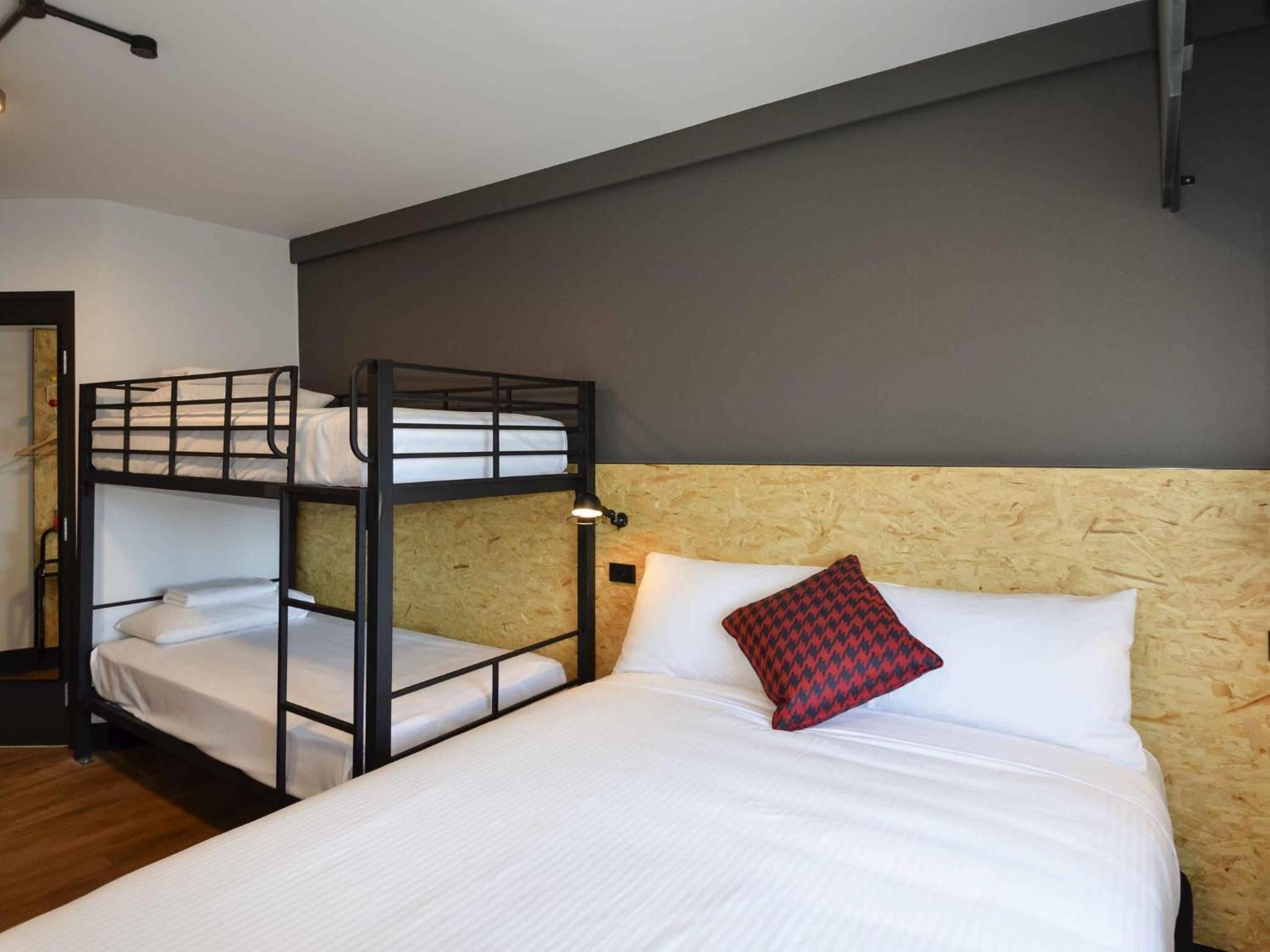 Standard Room with One Queen Bunk and One Set of Bunks - Photo 2