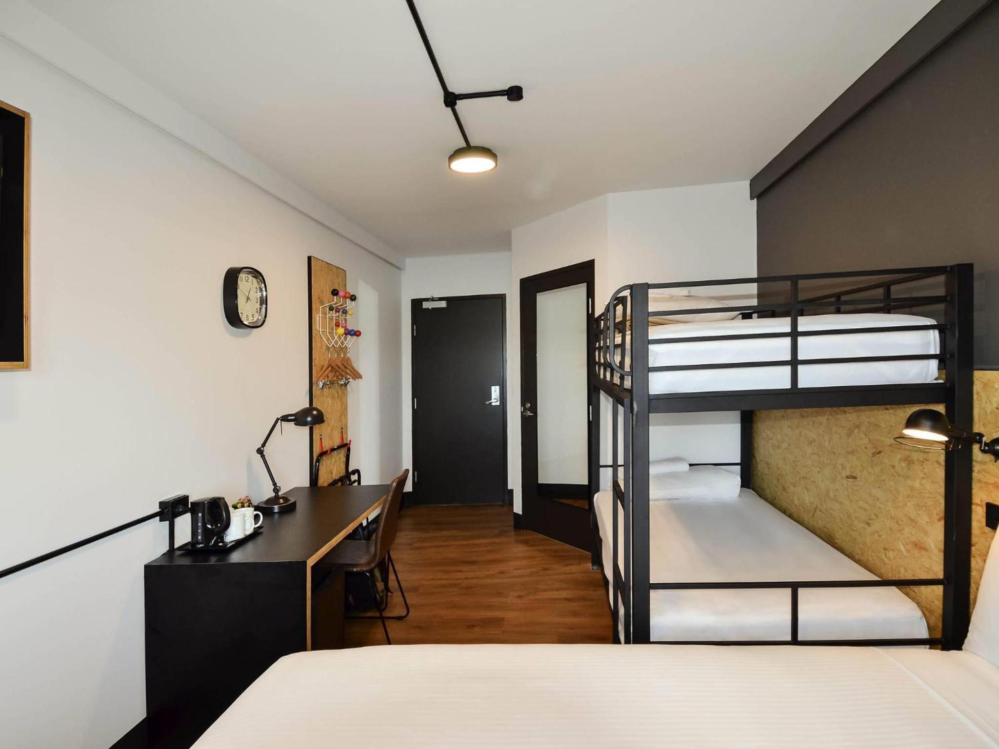 Standard Room with One Queen Bunk and One Set of Bunks - Photo 3
