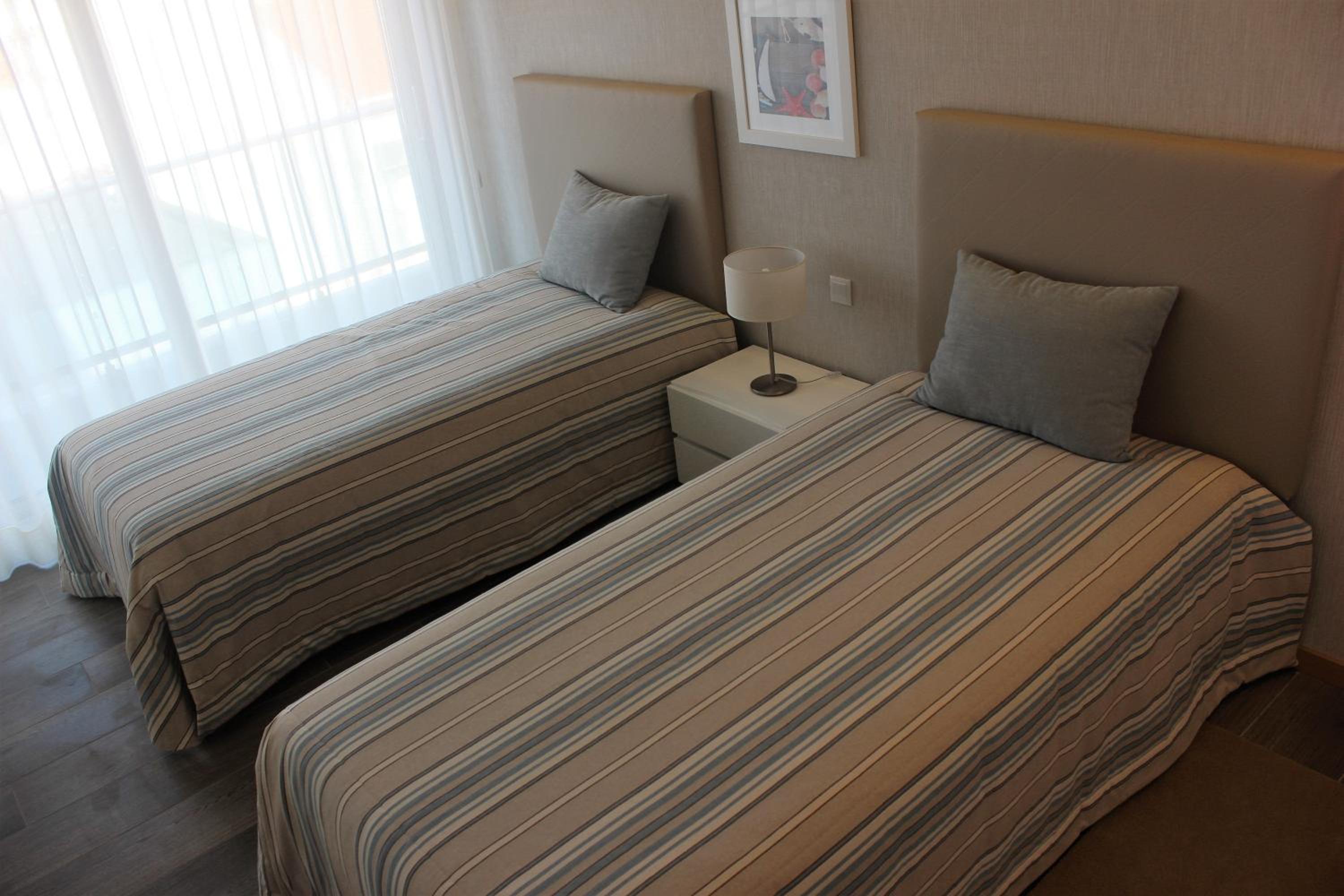 Three-Bedroom Apartment - Photo 16