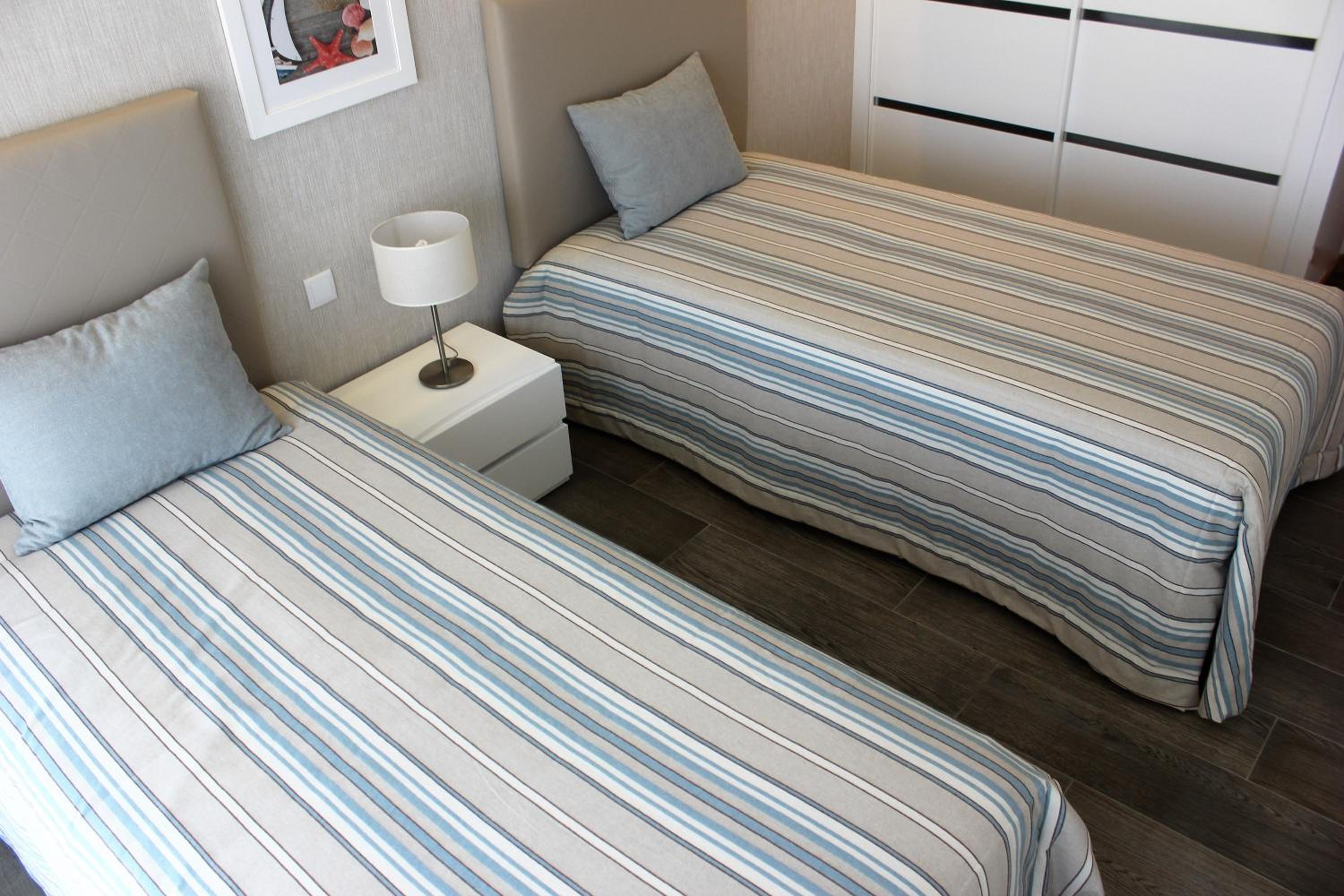 Three-Bedroom Apartment - Photo 18