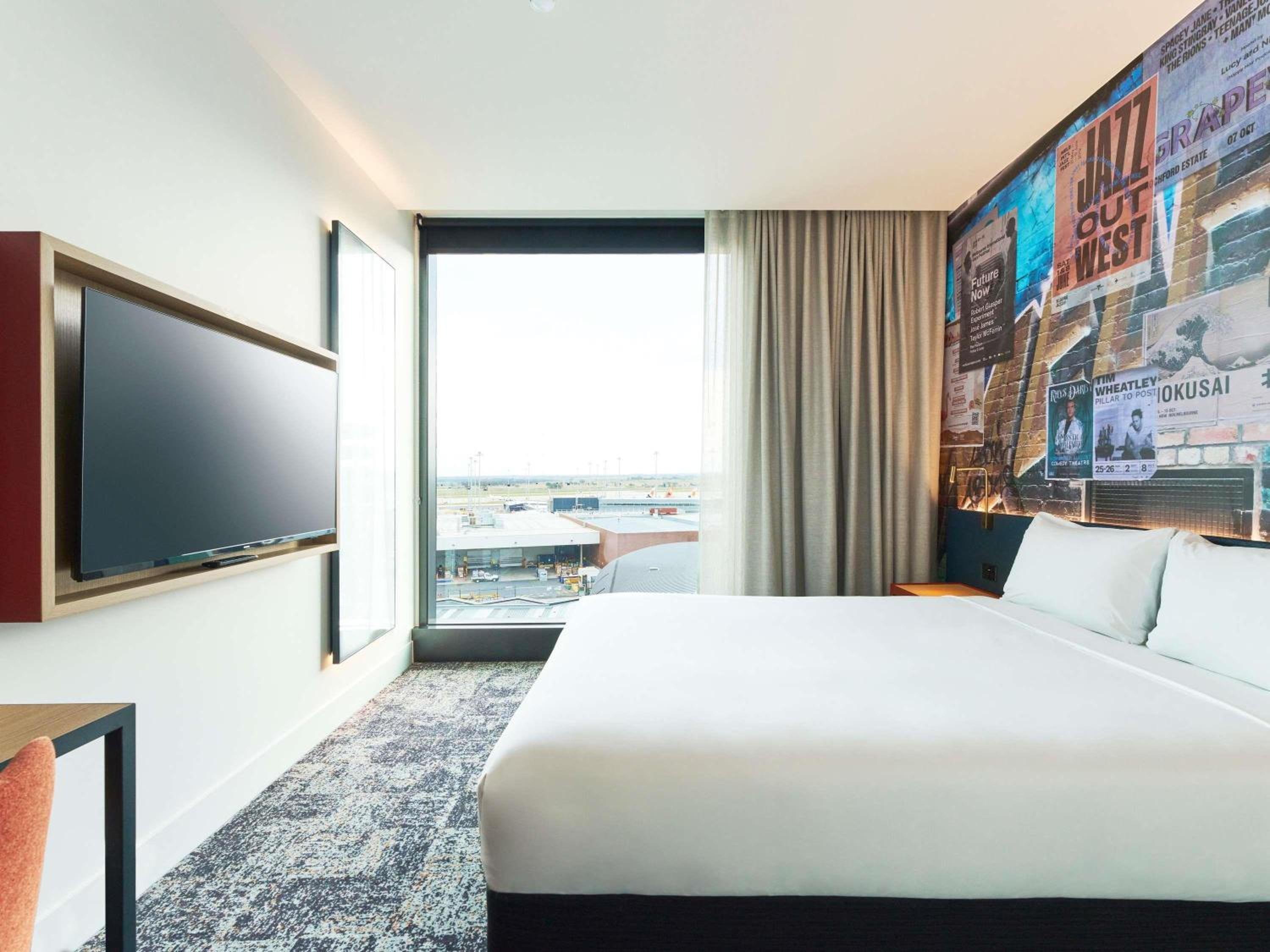Superior Queen Room with Runway View