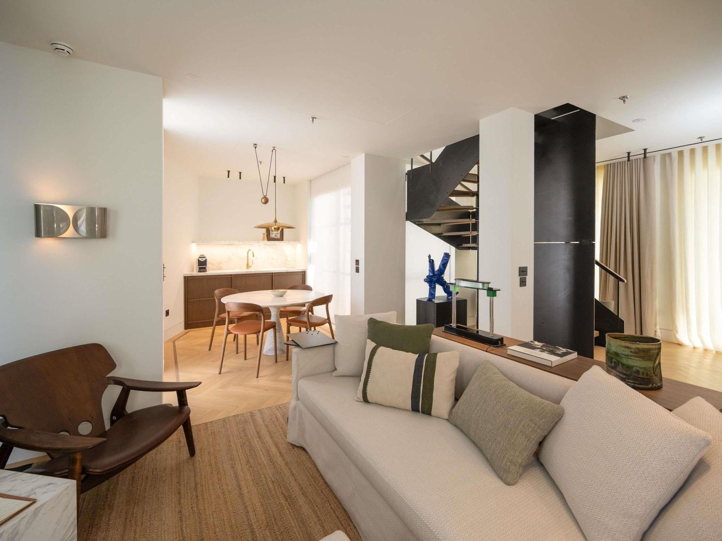 Duplex Executive Suite with One King Bed and Two Double Sofa Beds
