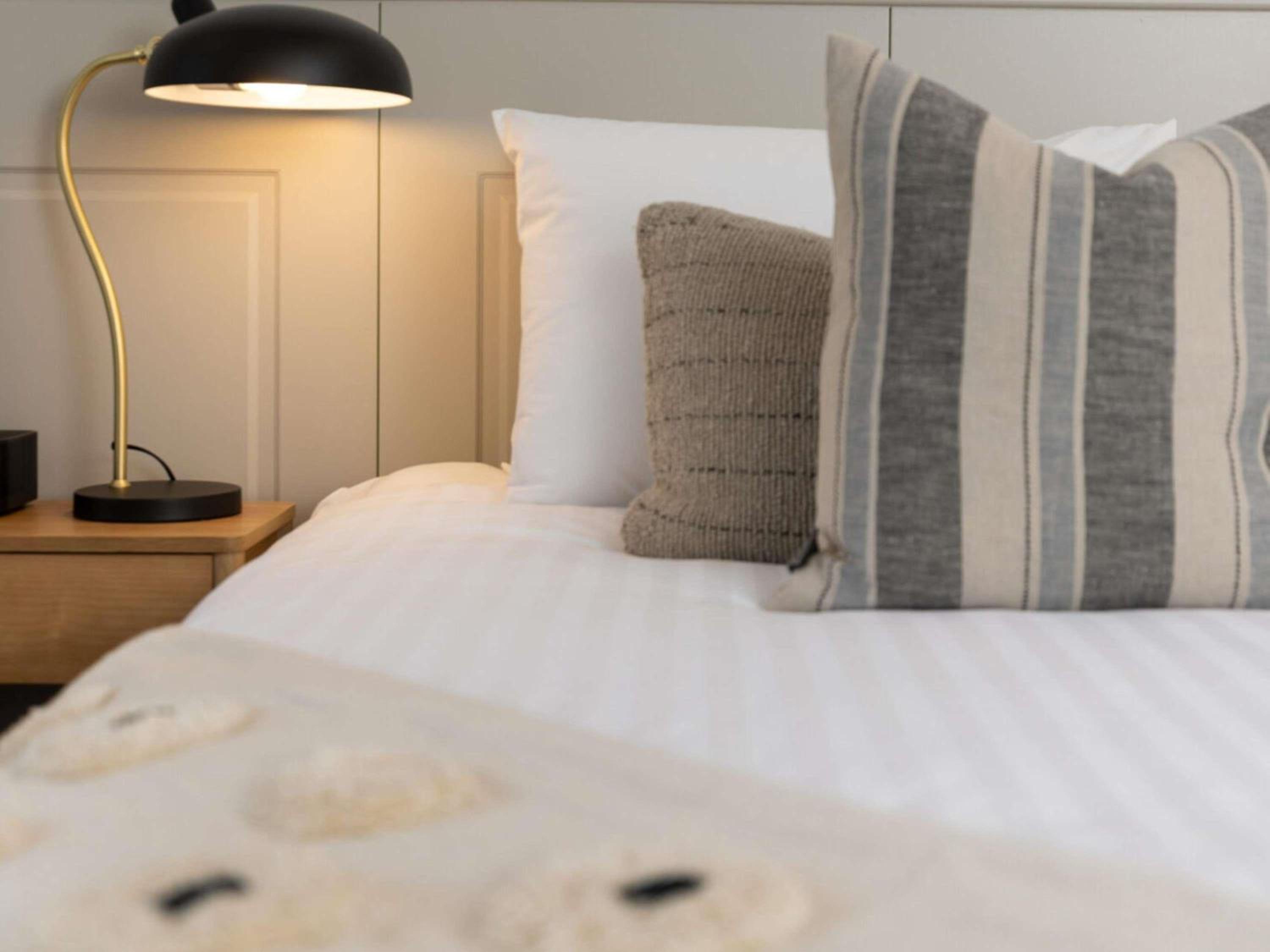 Deluxe Suite with One King Bed and One Queen Bed - Photo 1