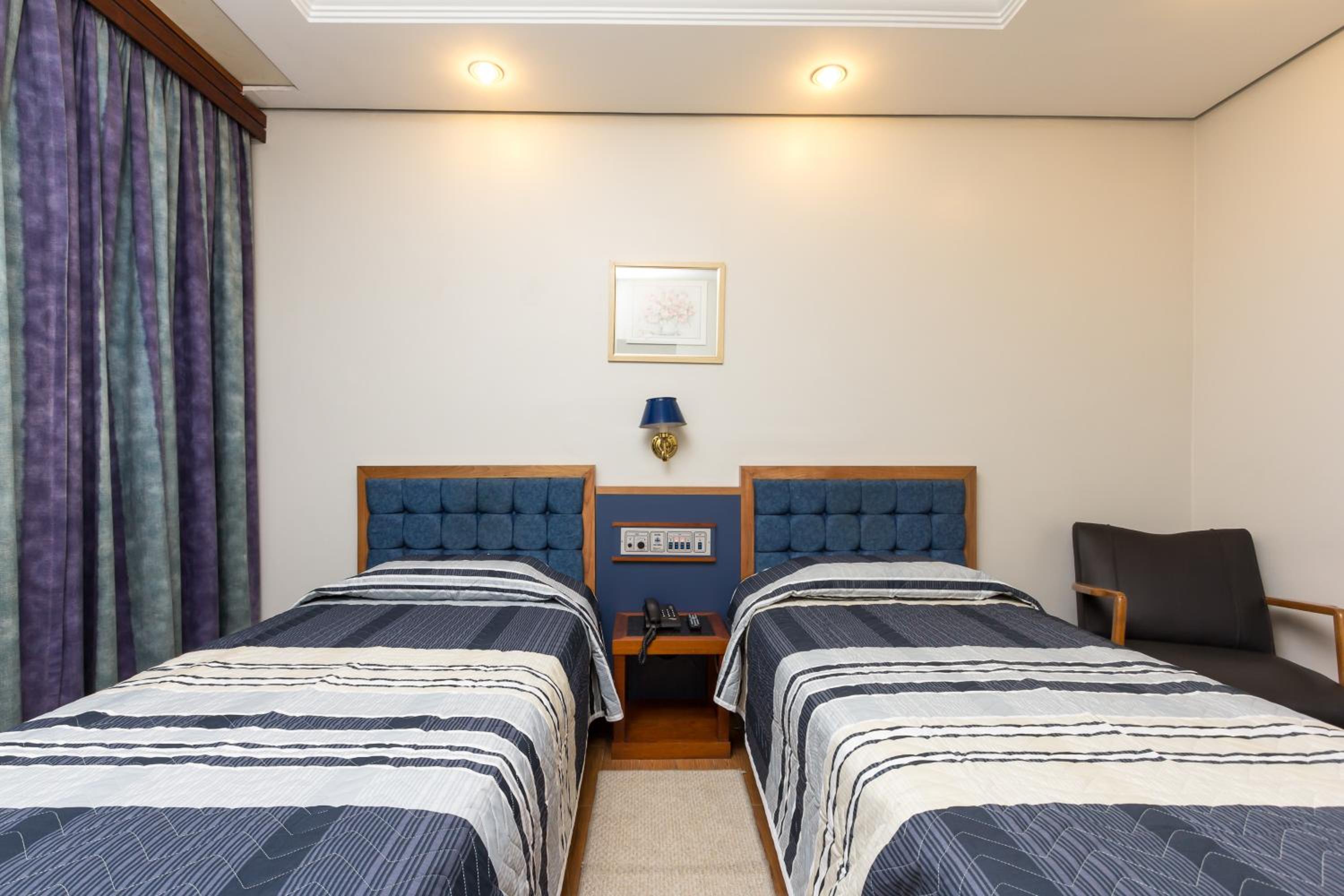 Standard Twin Room - Photo 7