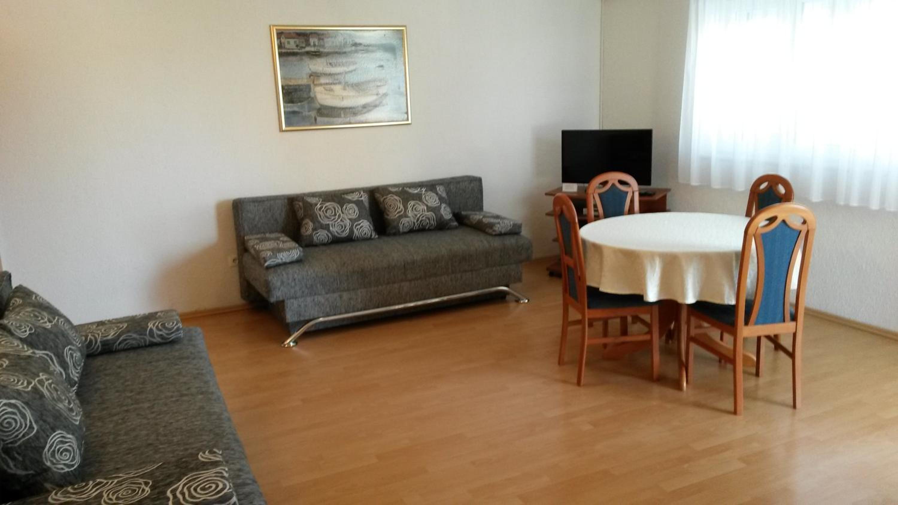 One-Bedroom Apartment with Balcony and Sea View