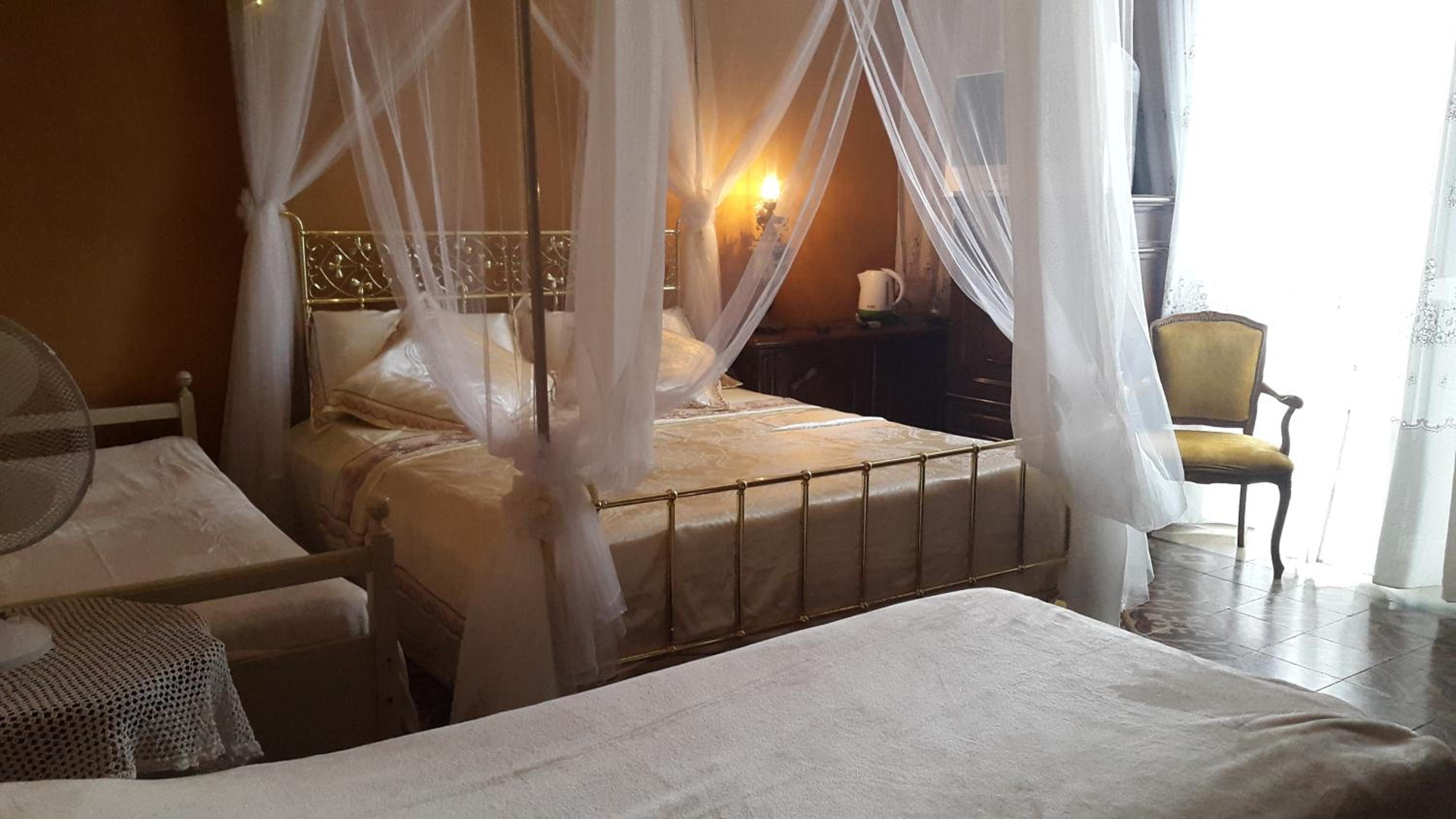 Quadruple Room with Private Bathroom photo 1