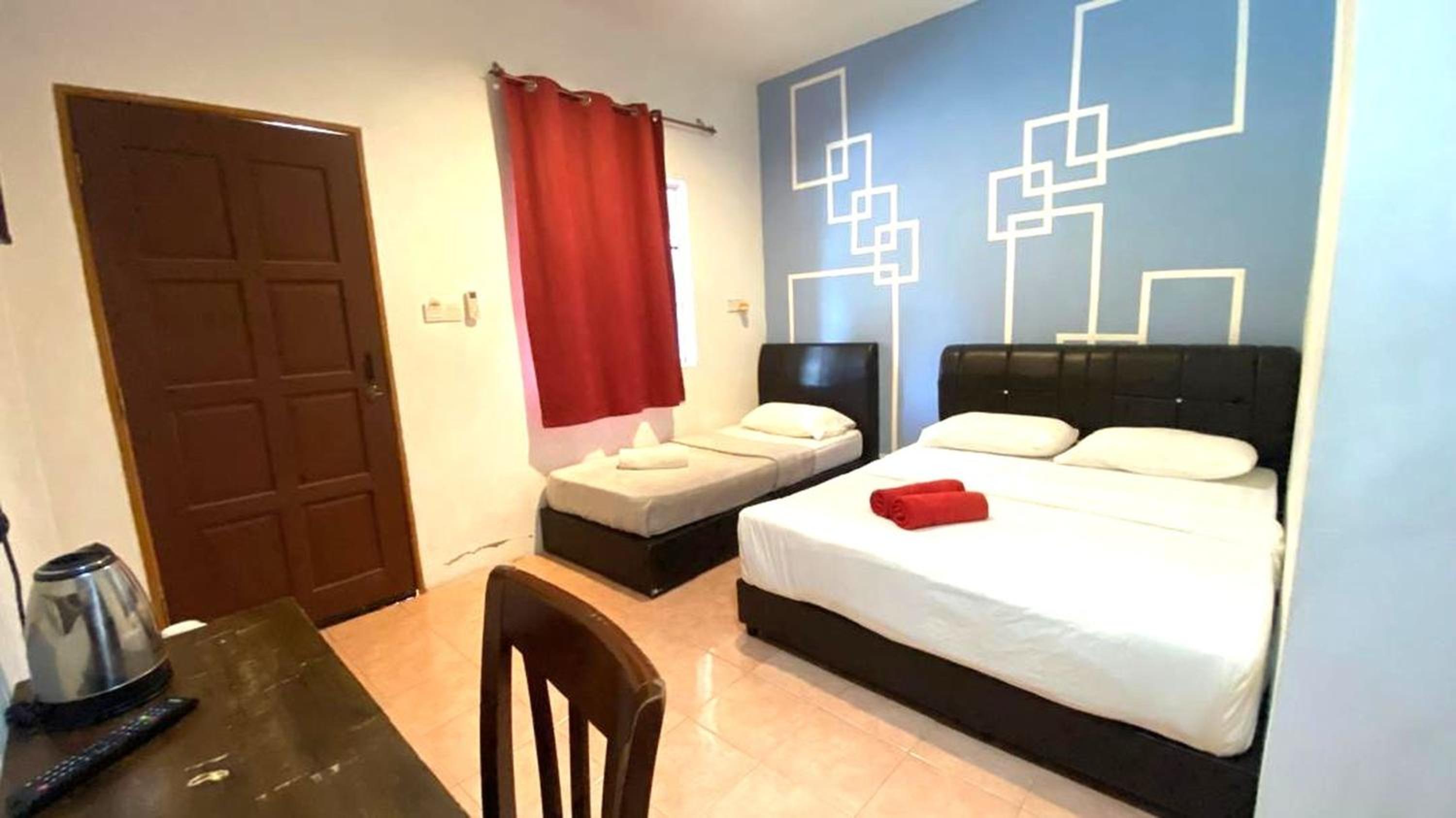 Deluxe Triple Room