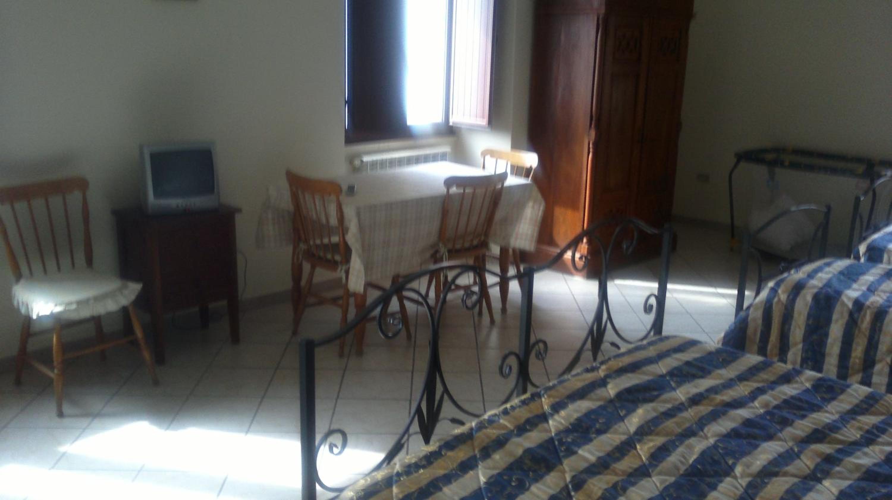 Quadruple Room - Photo 17