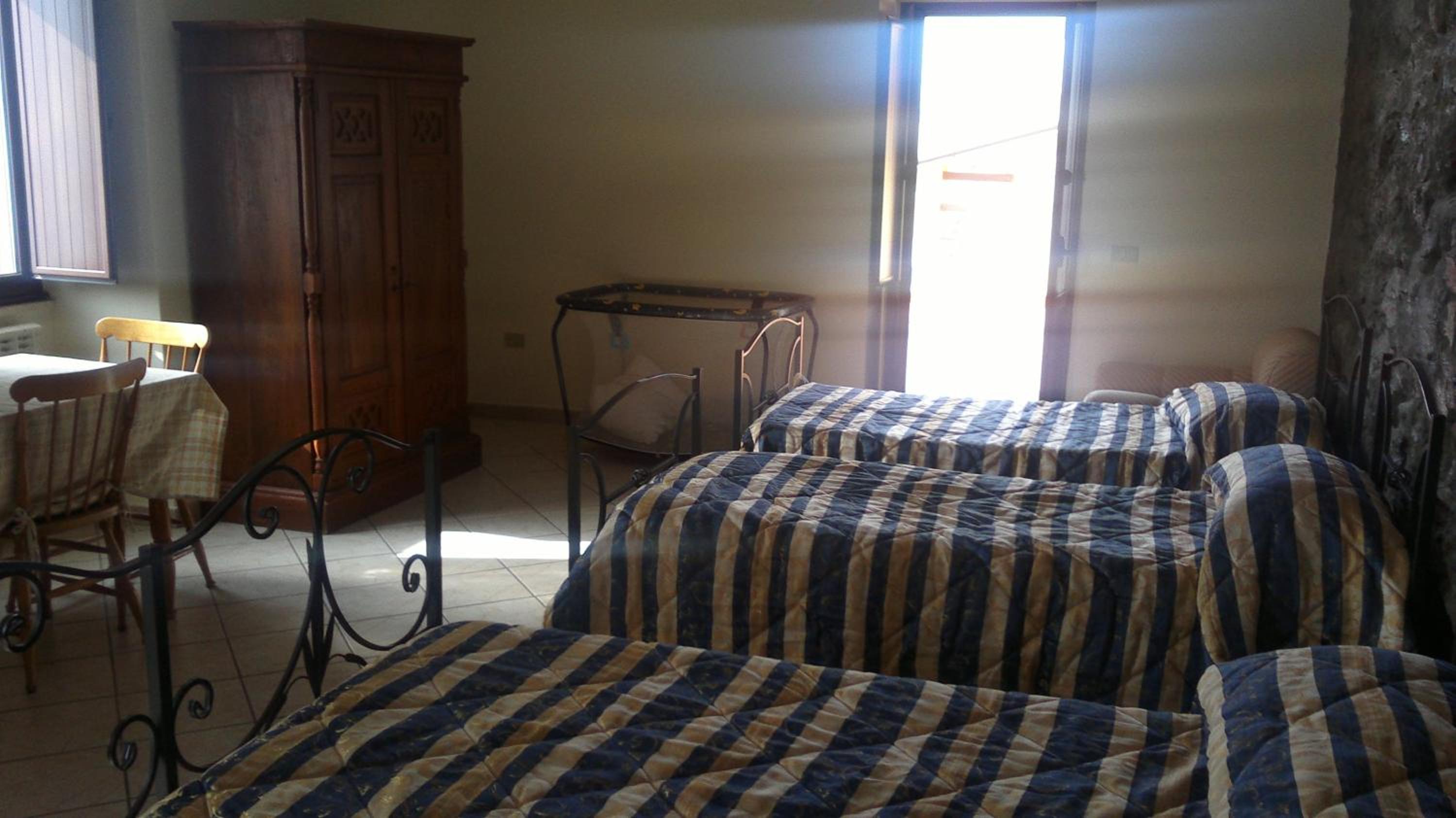 Quadruple Room - Photo 19