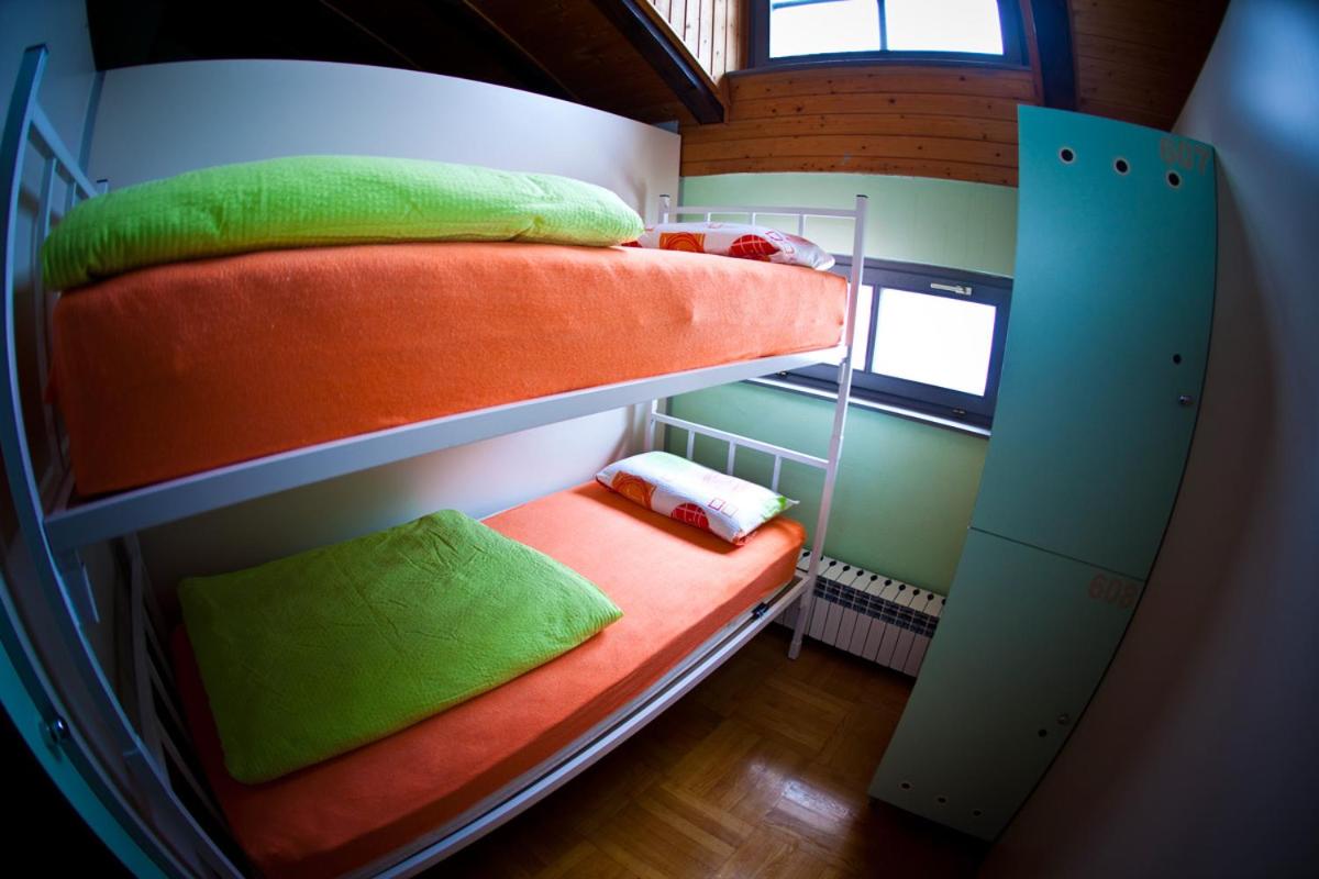 Single Bed in Dormitory Room
