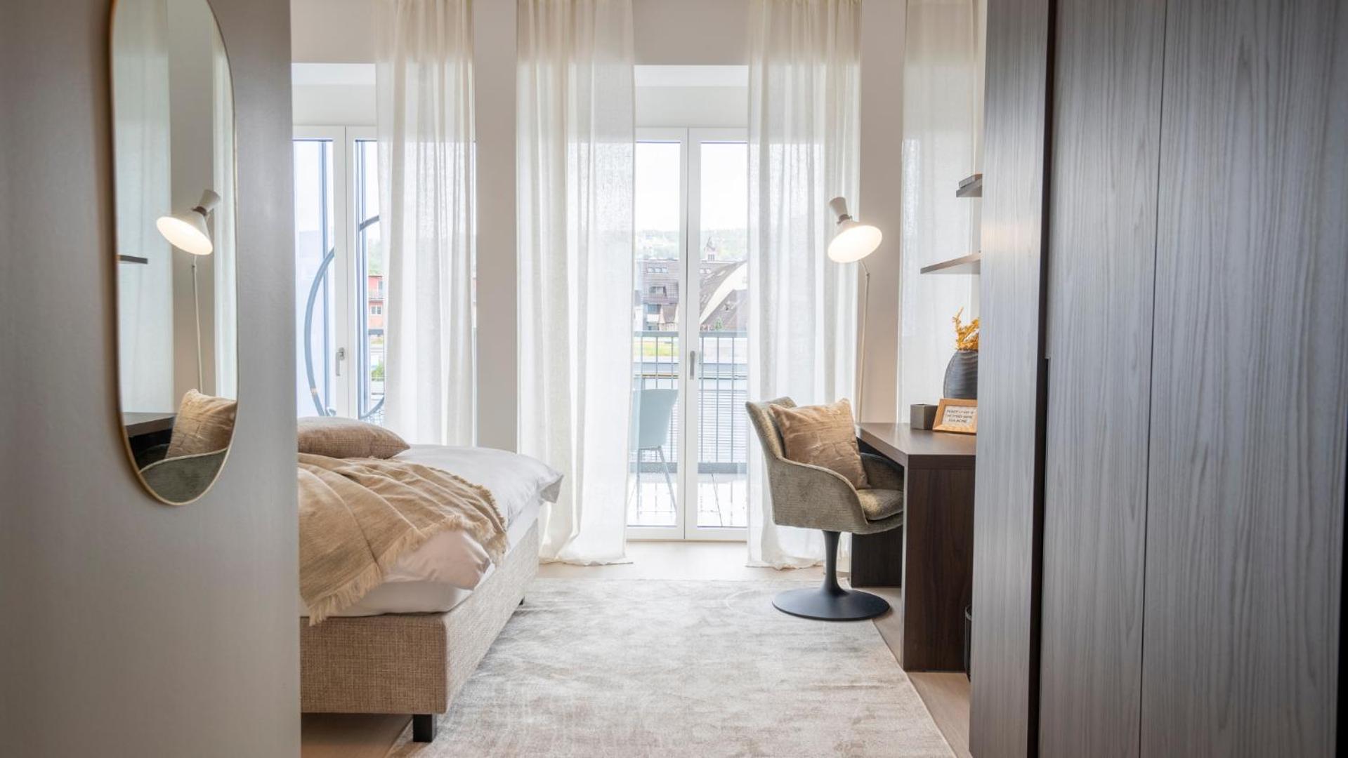 One-Bedroom Apartment with Balcony and City View