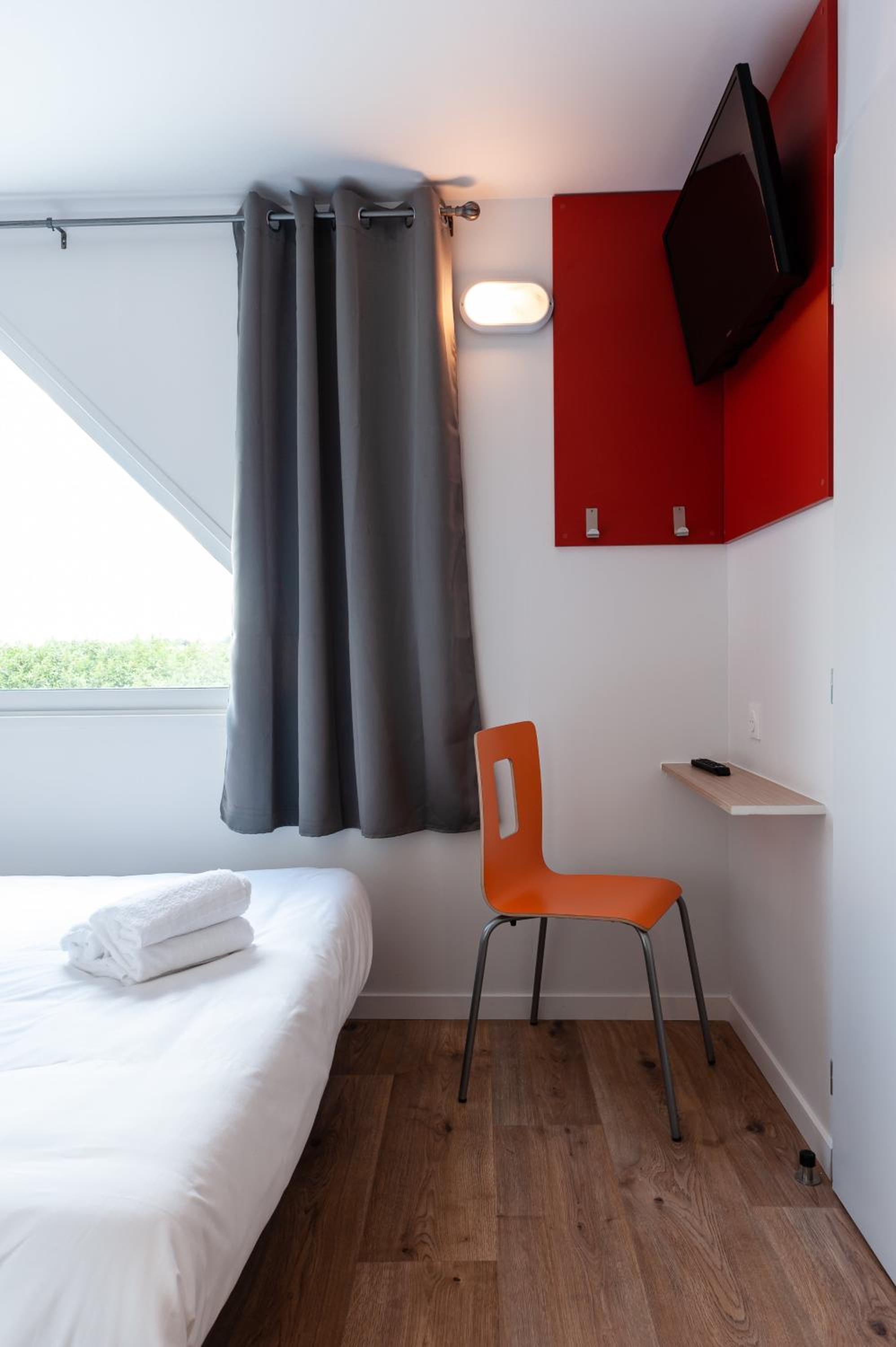 Standard Room with One Queen Bed and Two Single Beds
