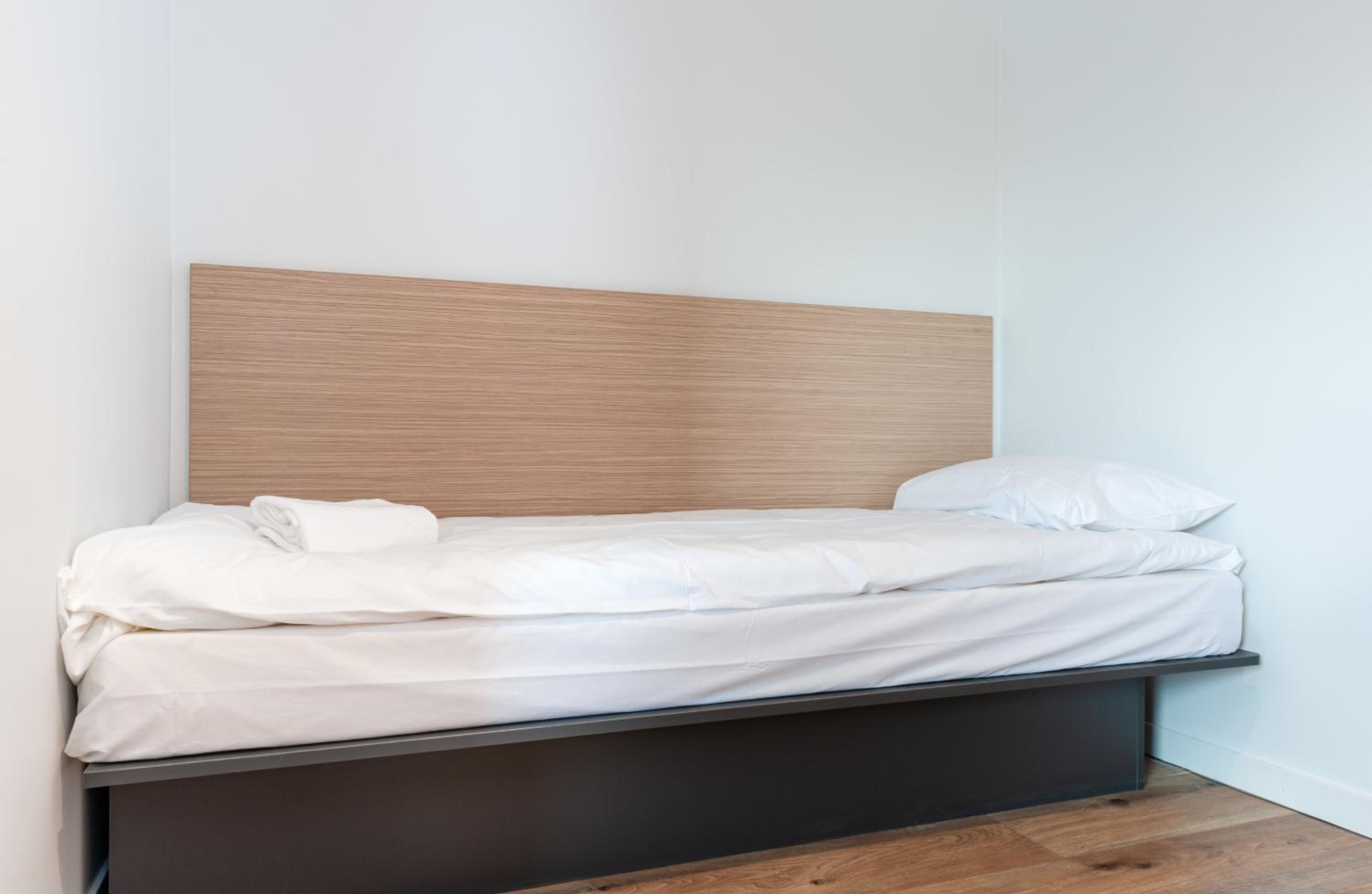 Standard Room with One Queen Bed and Three Single Beds