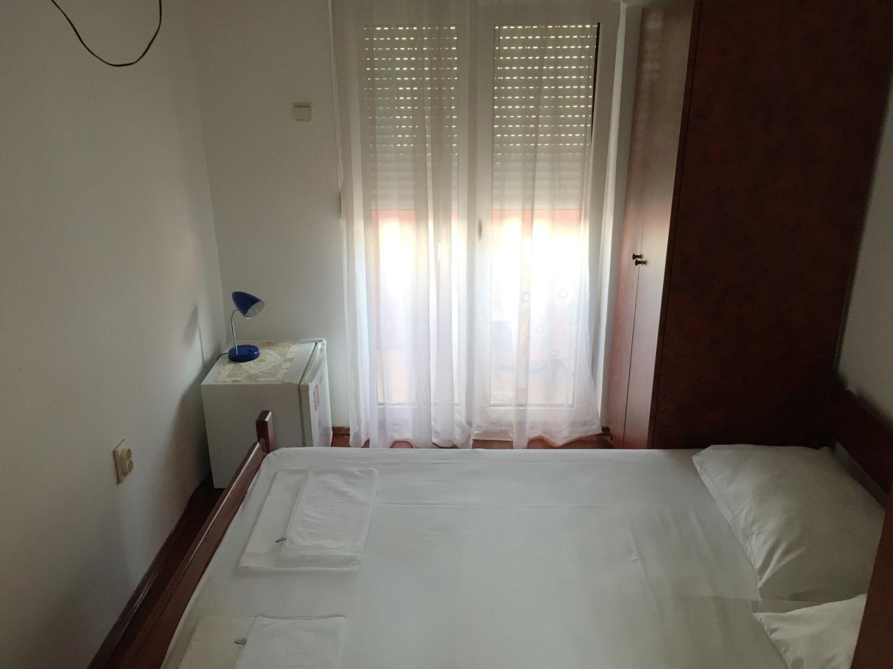 Standard Double Room with Shared Bathroom