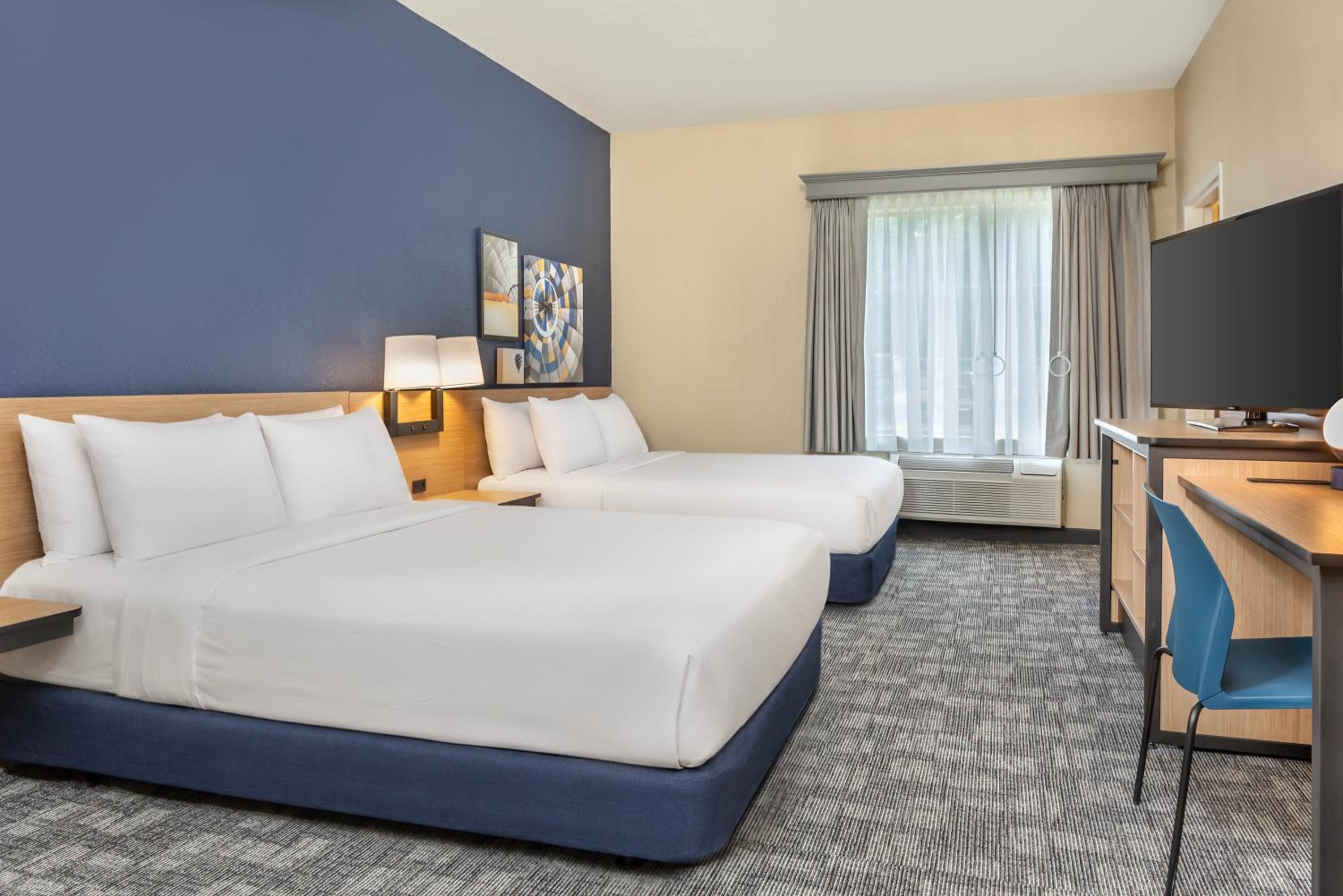 Queen Room with Two Queen Beds, Sofa Bed, Roll-In Shower and Limited View - Mobility and Hearing Accessible