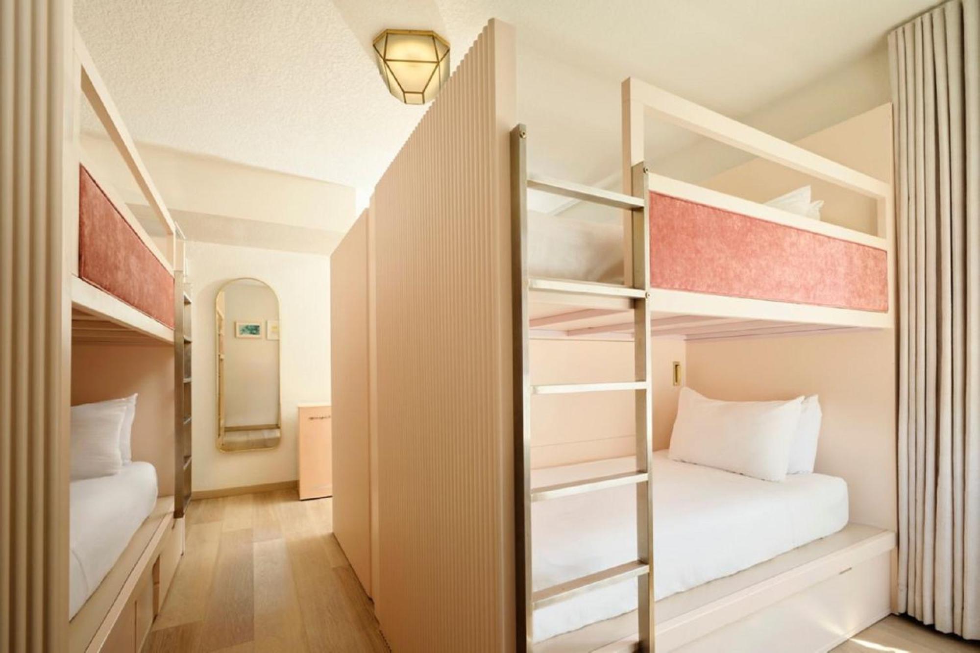 Triple Bunk Room with Three Twin Bunk Beds and Pool View