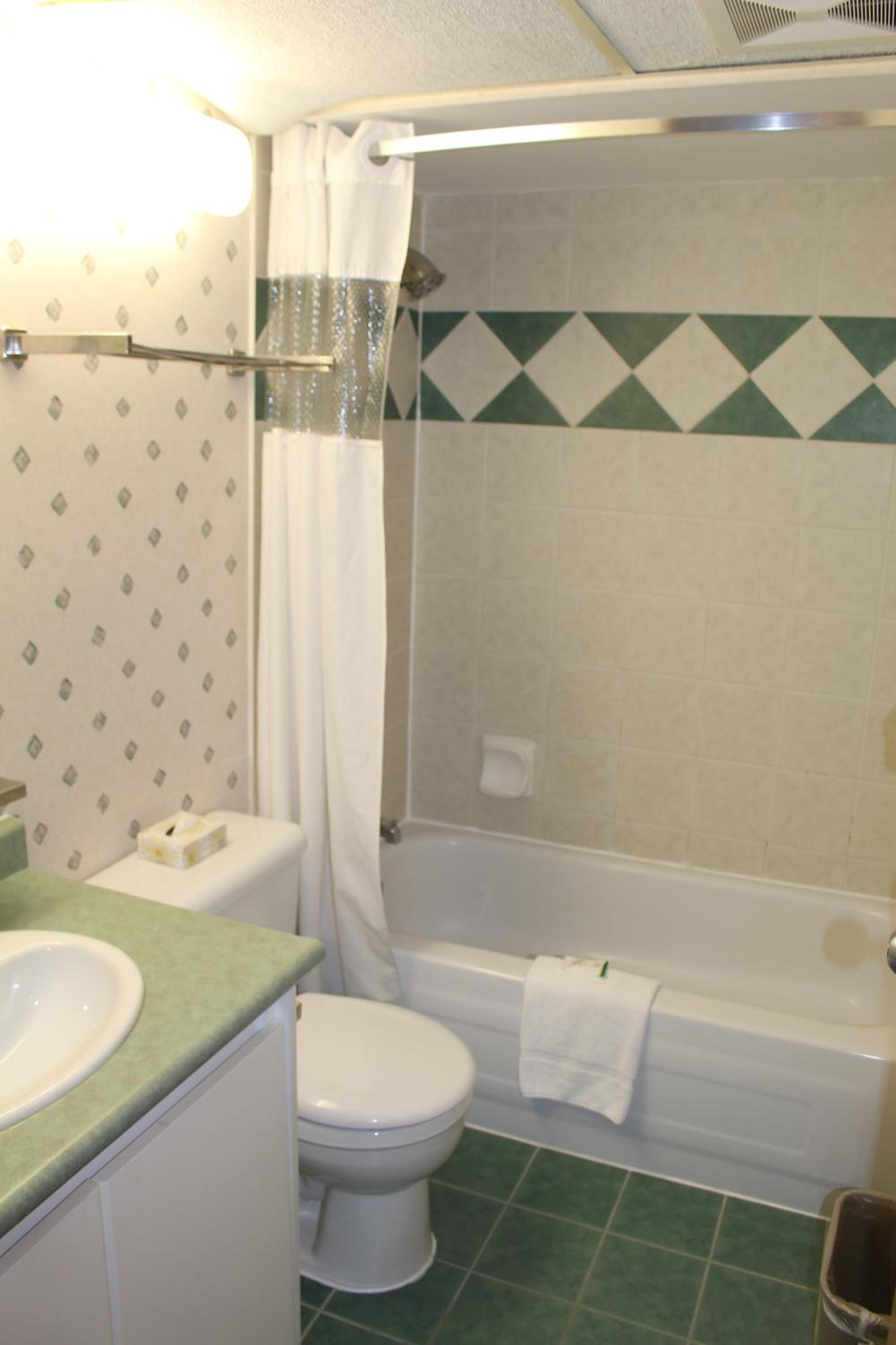 Queen Room with Two Queen Beds with Kitchenette - Photo 2
