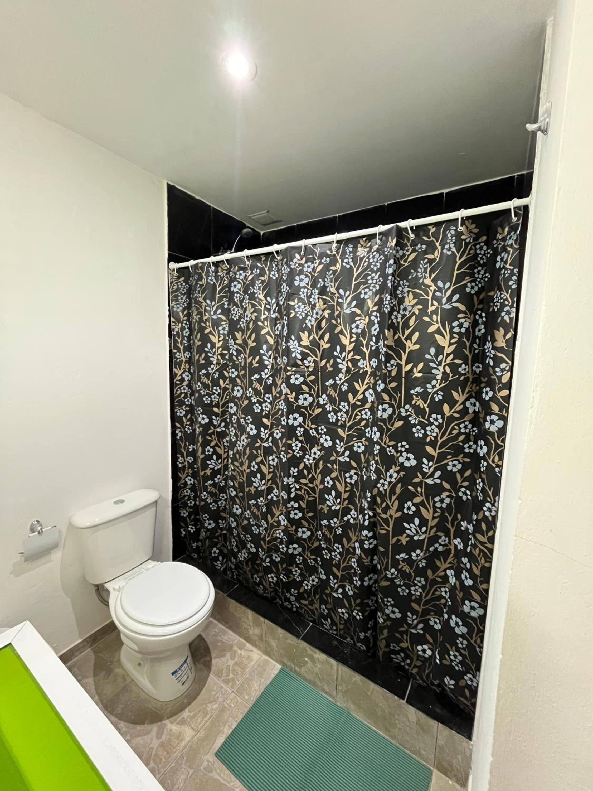 Quadruple Room with Private Bathroom