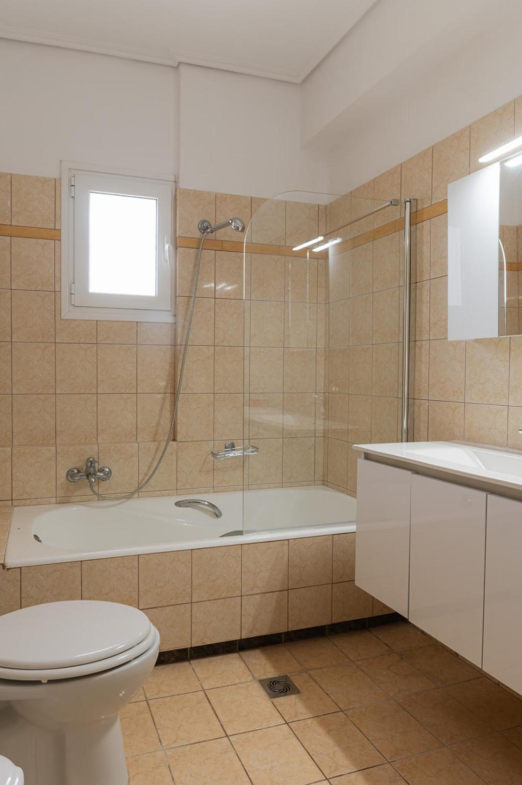 Three-Bedroom Apartment with Balcony