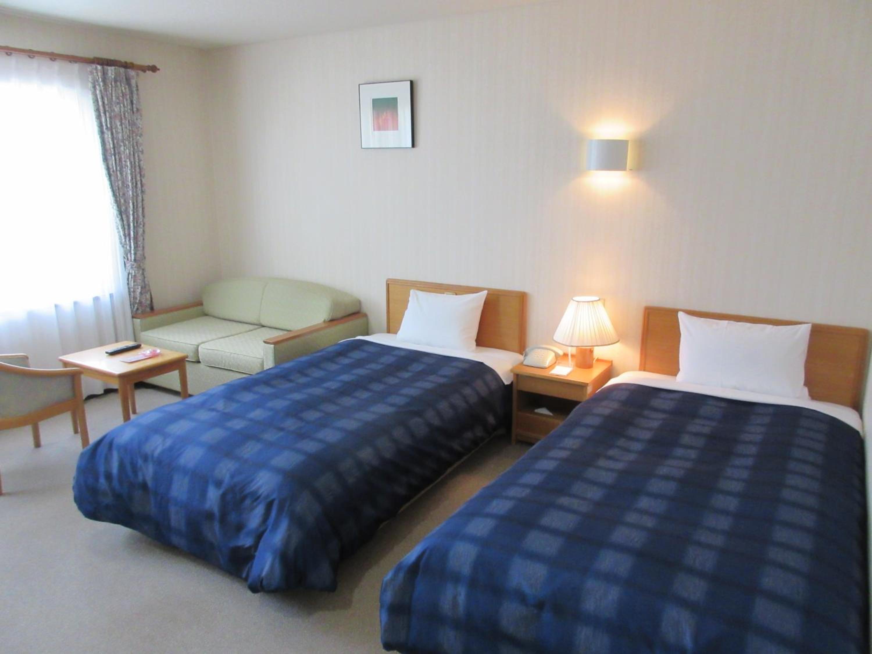 Twin Room - Photo 2