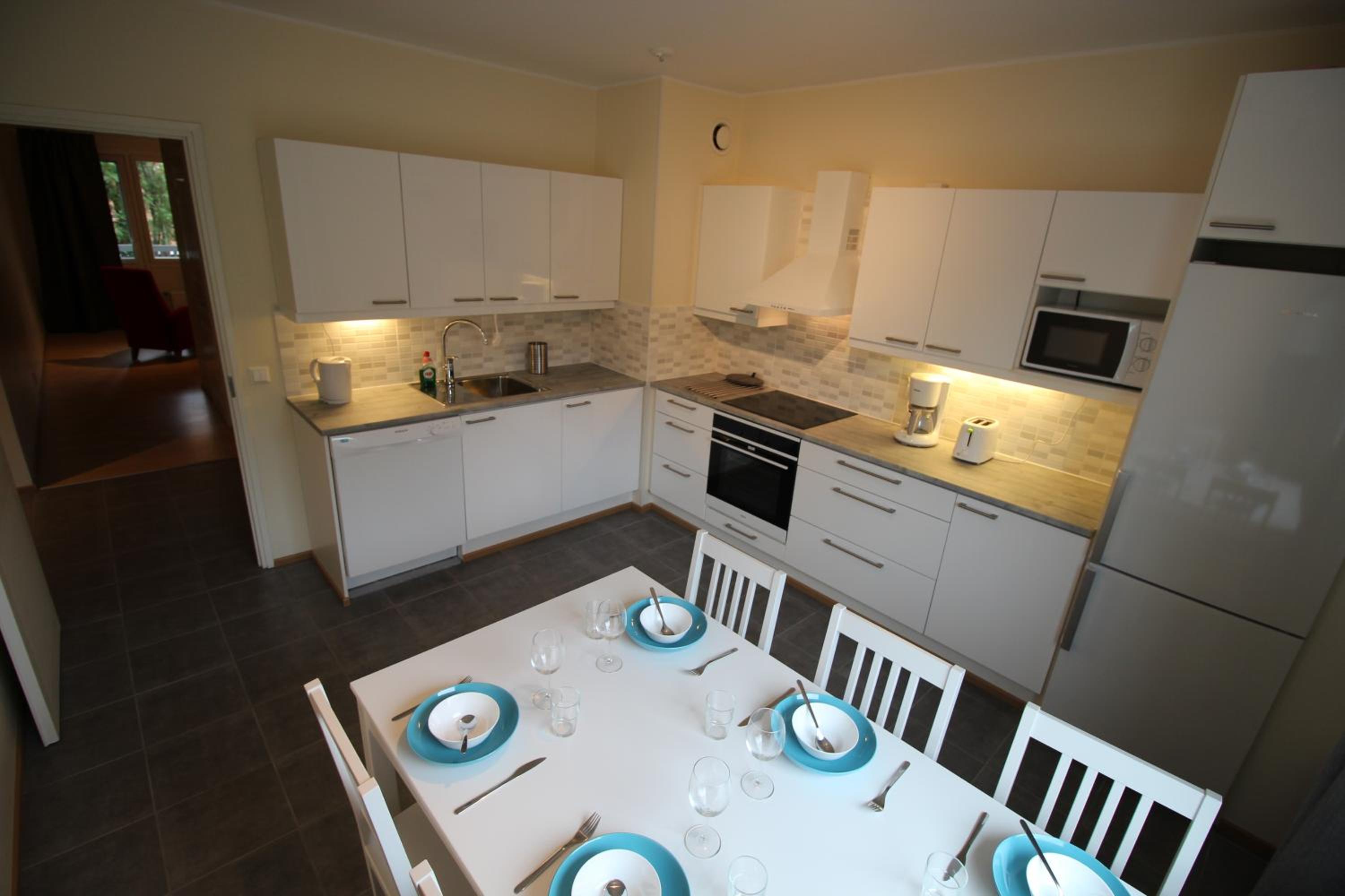 Three-Bedroom Apartment - Photo 12