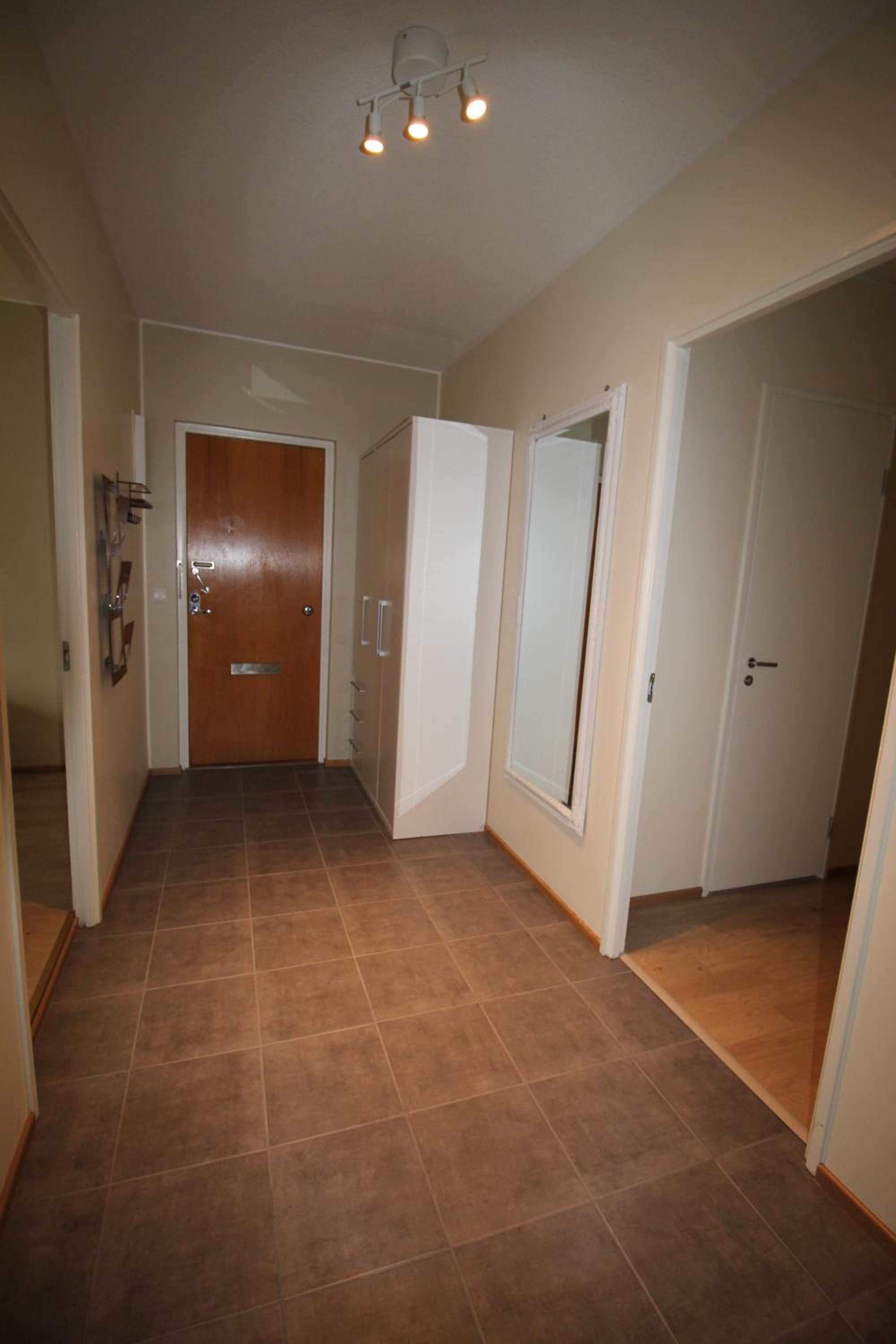 Three-Bedroom Apartment - Photo 7