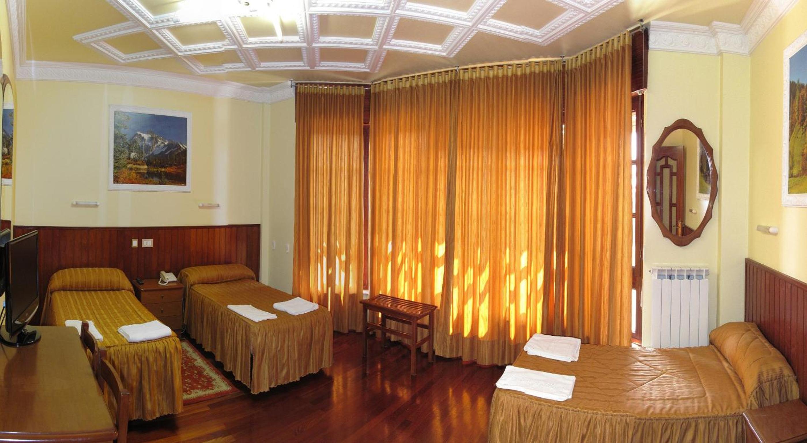 Triple Room - Photo 1