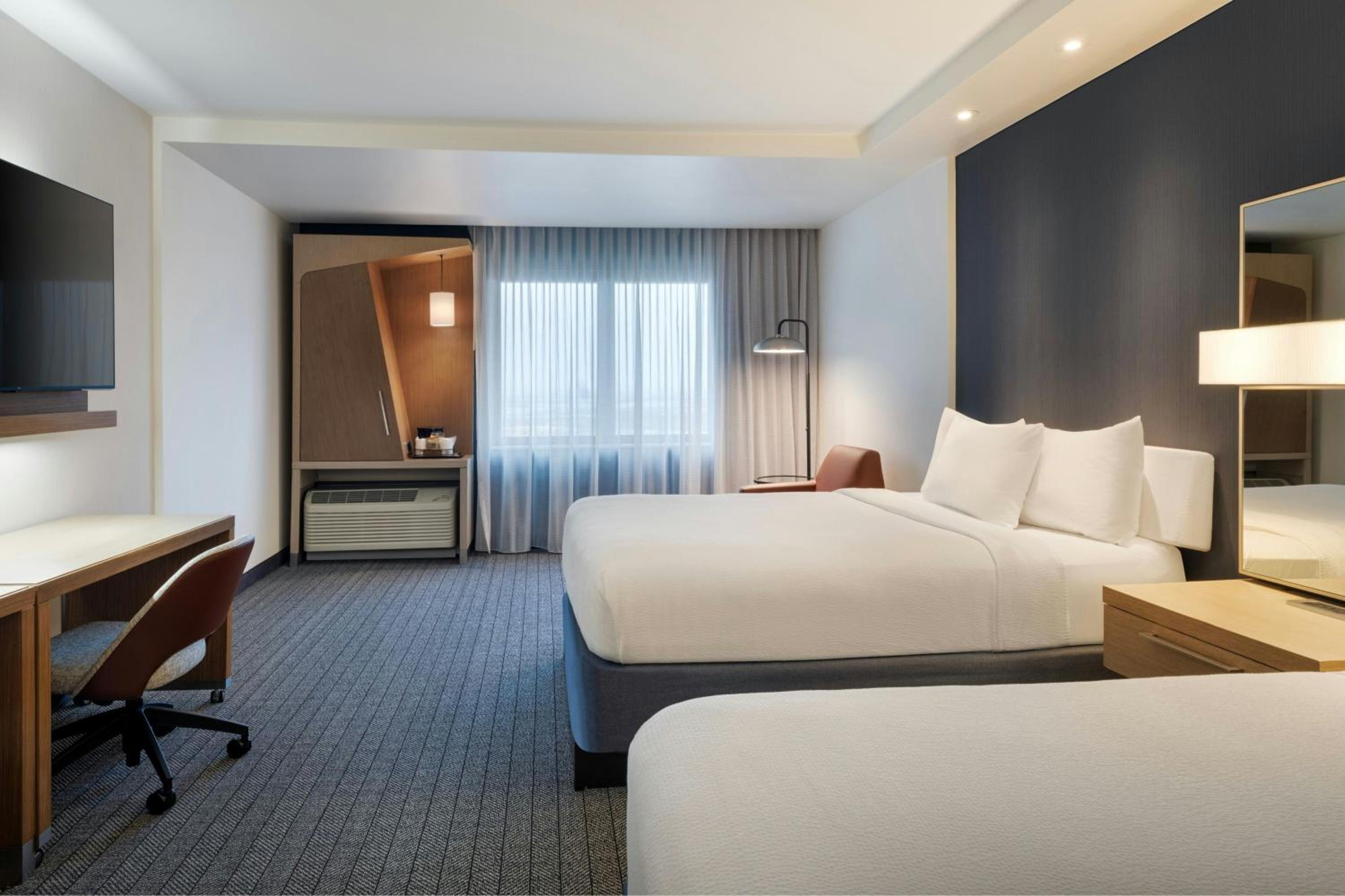 Queen Room with Two Queen Beds and Roll-In Shower - Mobility Access photo 2