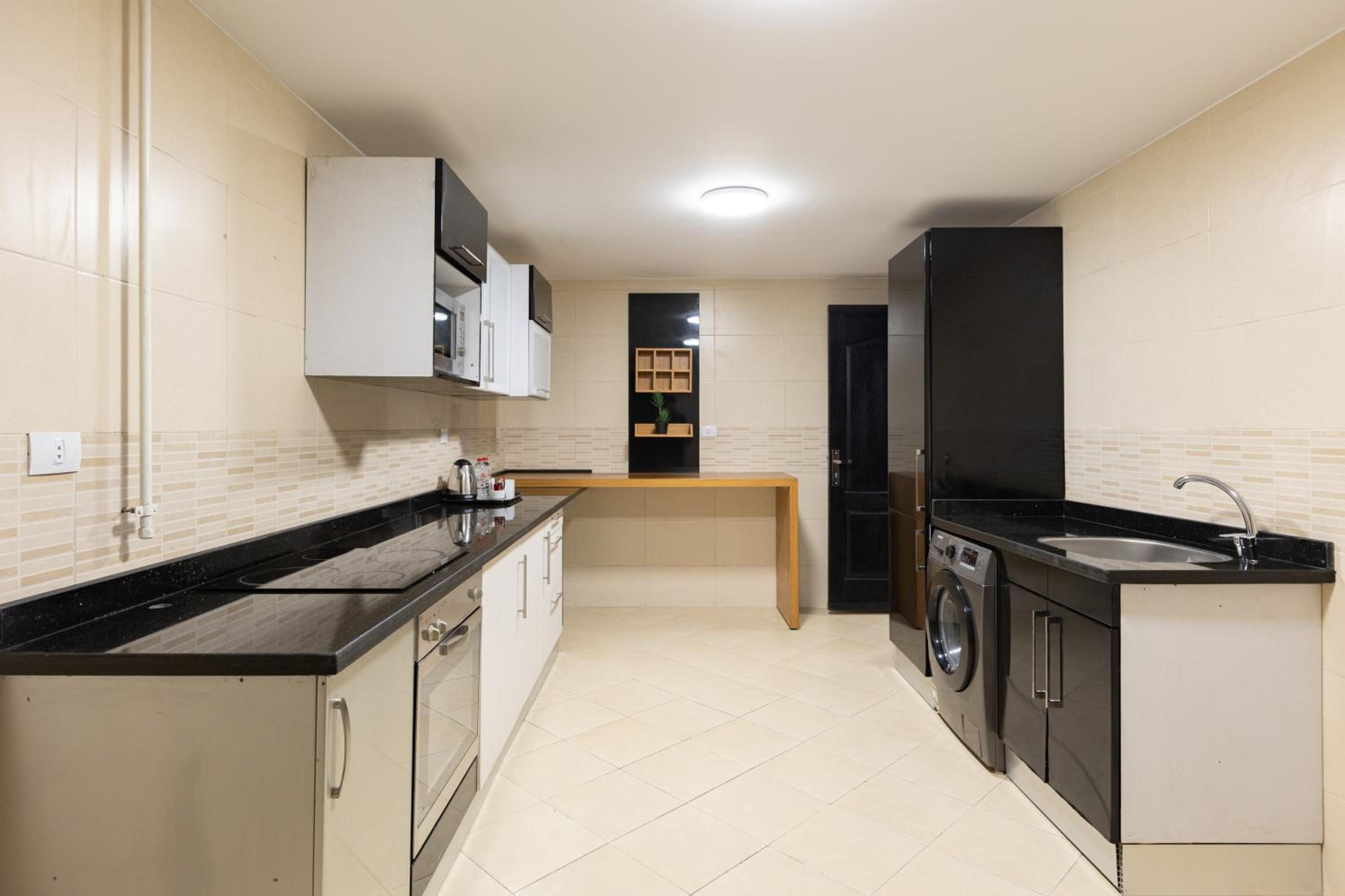 Three-Bedroom Apartment - Photo 12