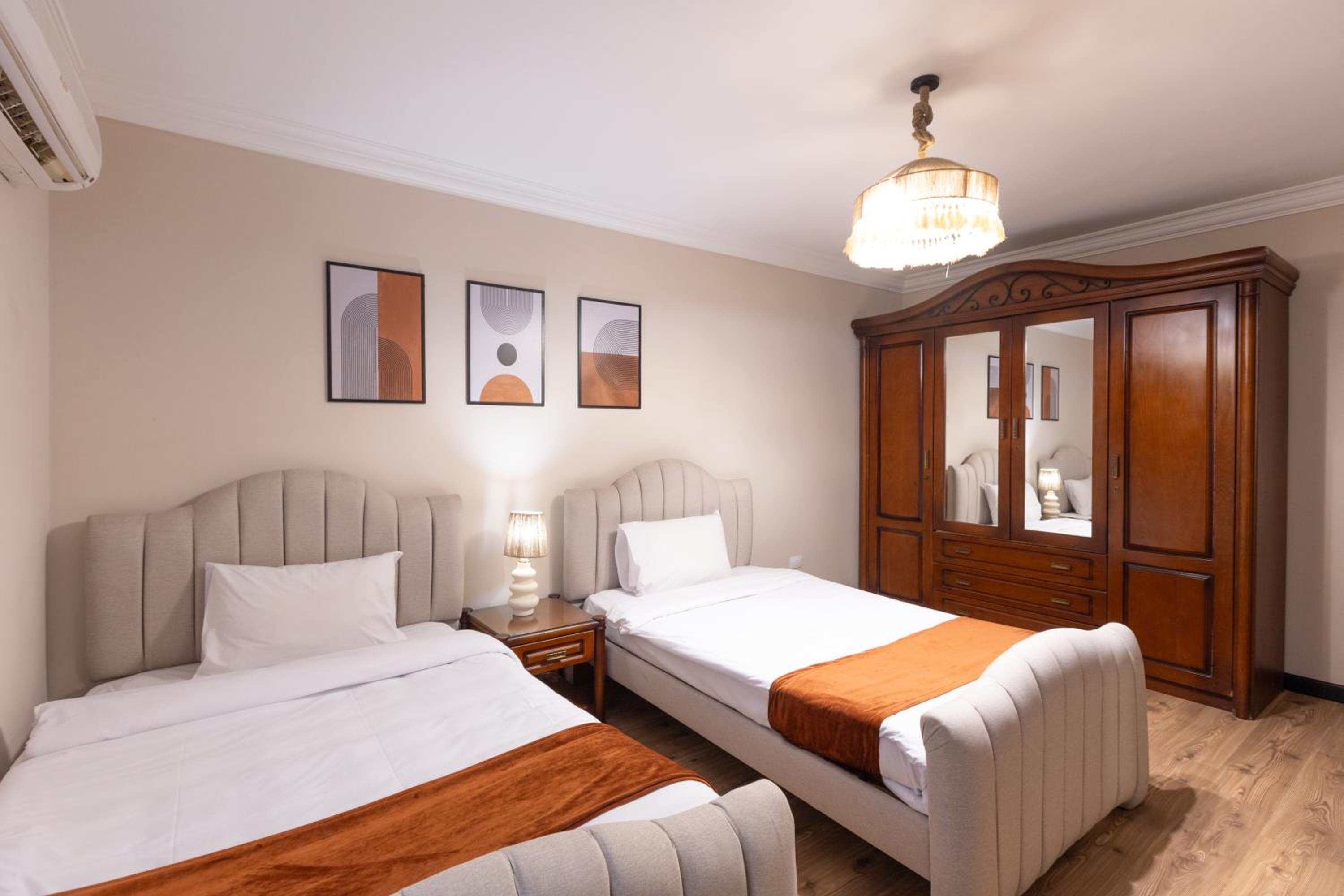 Three-Bedroom Apartment - Photo 9
