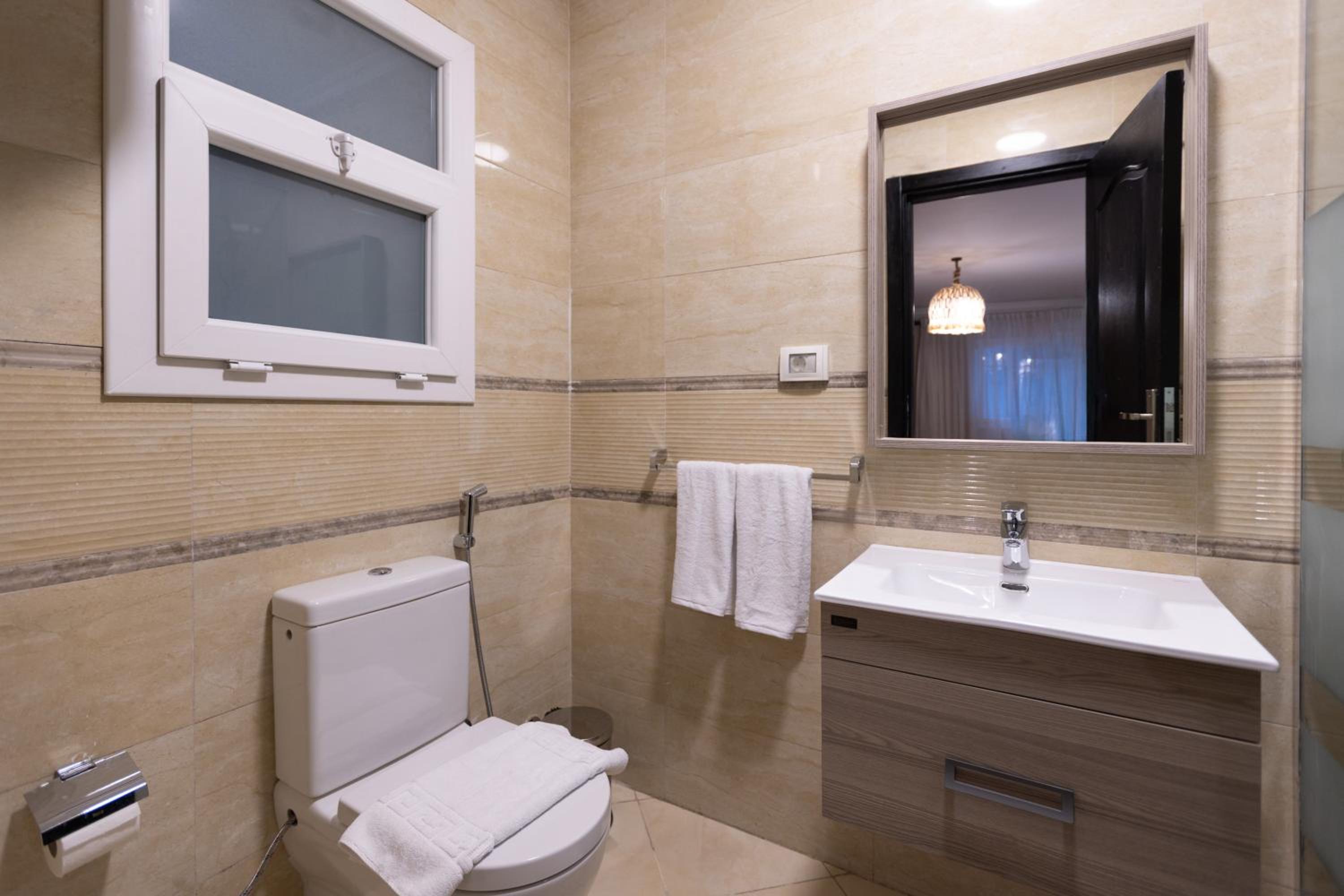 Three-Bedroom Apartment - Photo 14