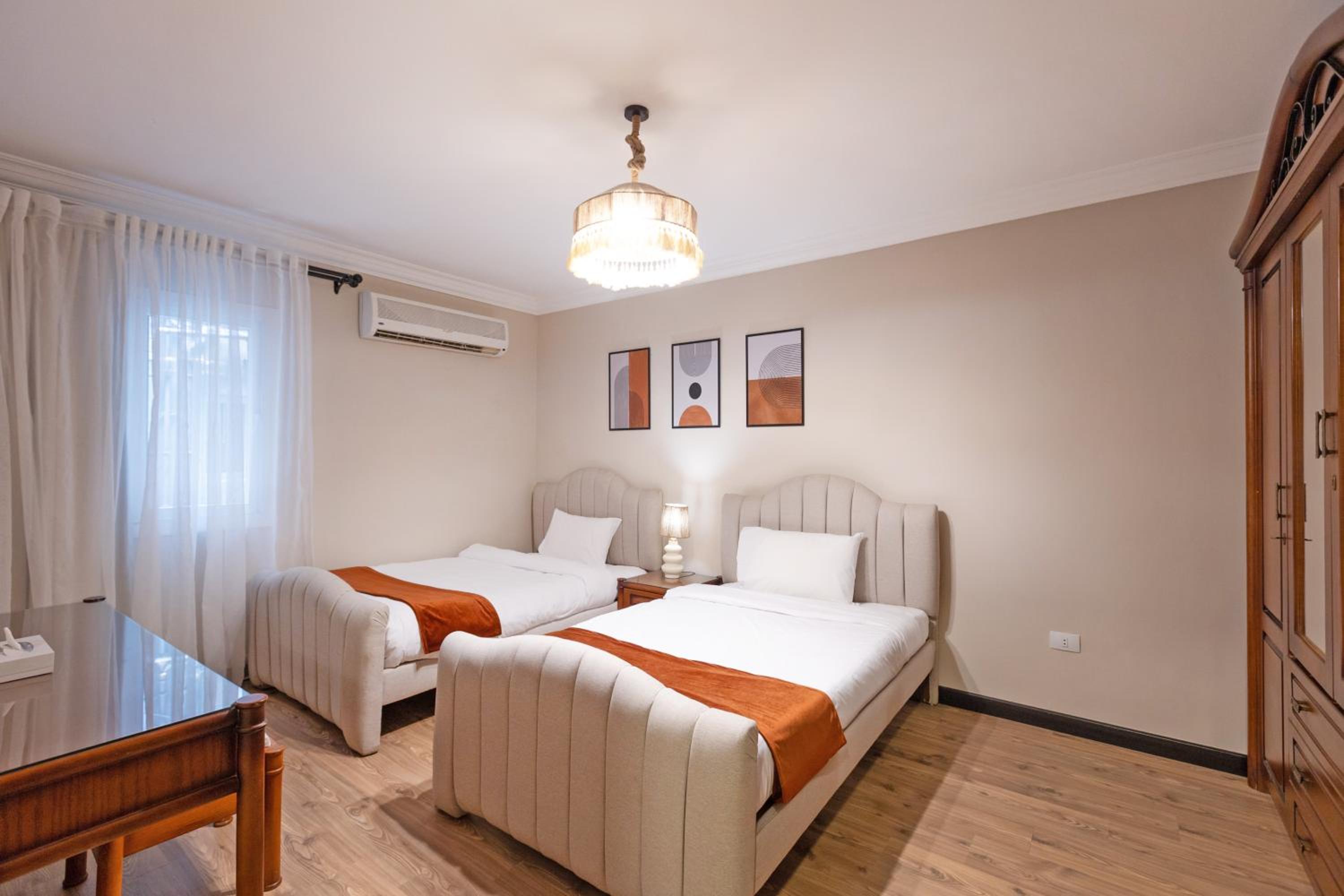 Three-Bedroom Apartment - Photo 15