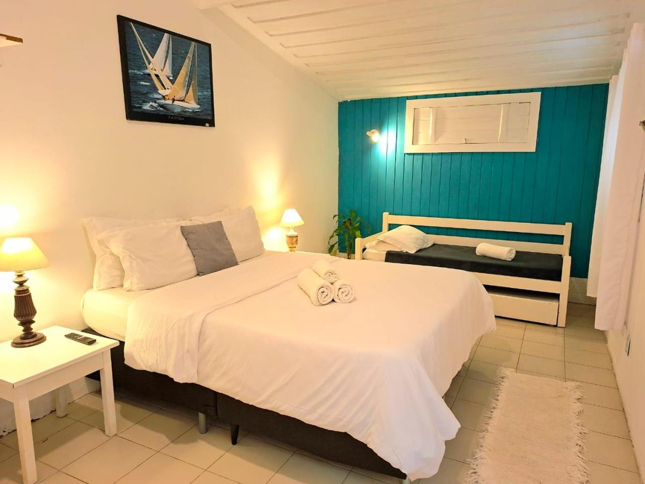 Economy Triple Room photo 2