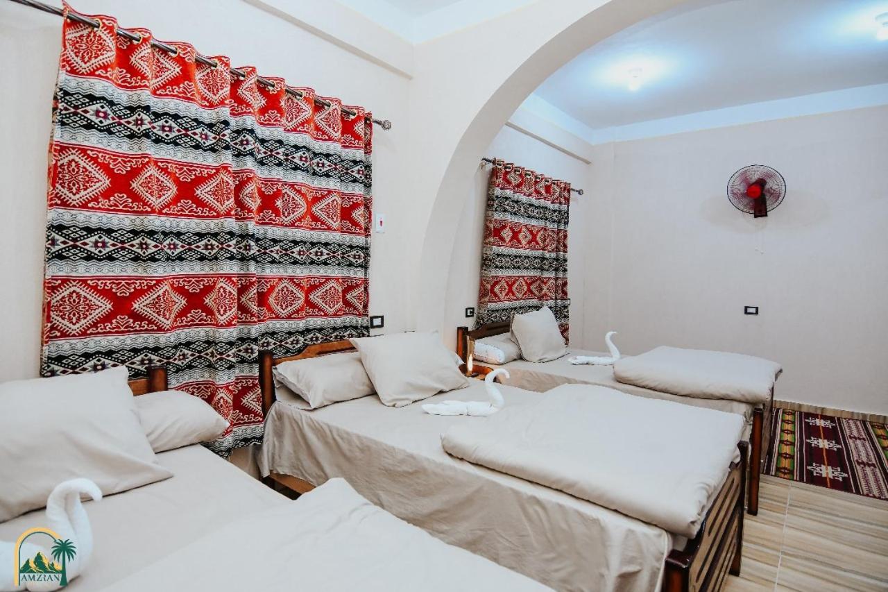 Economy Triple Room photo 2