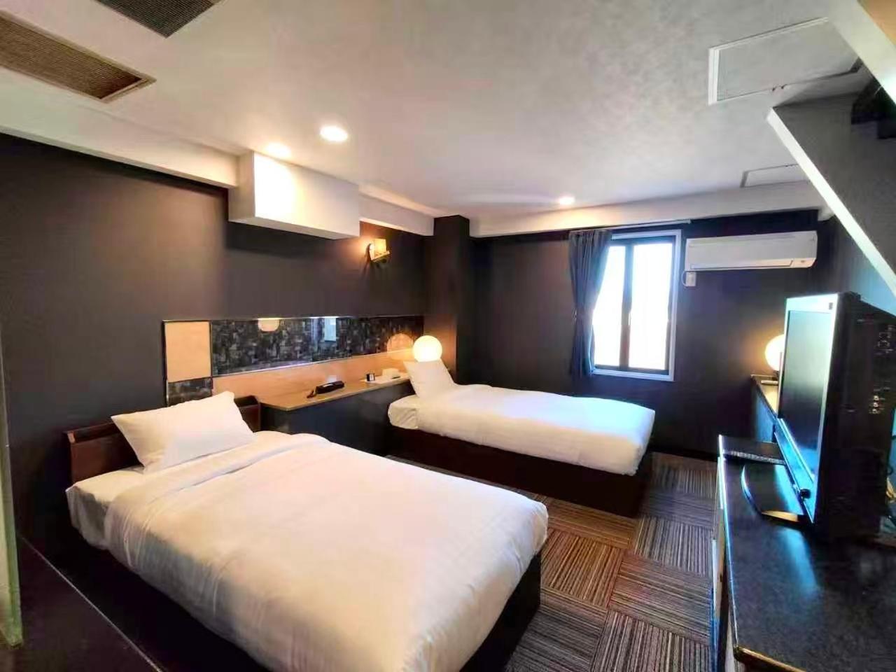 Twin Room - Photo 1