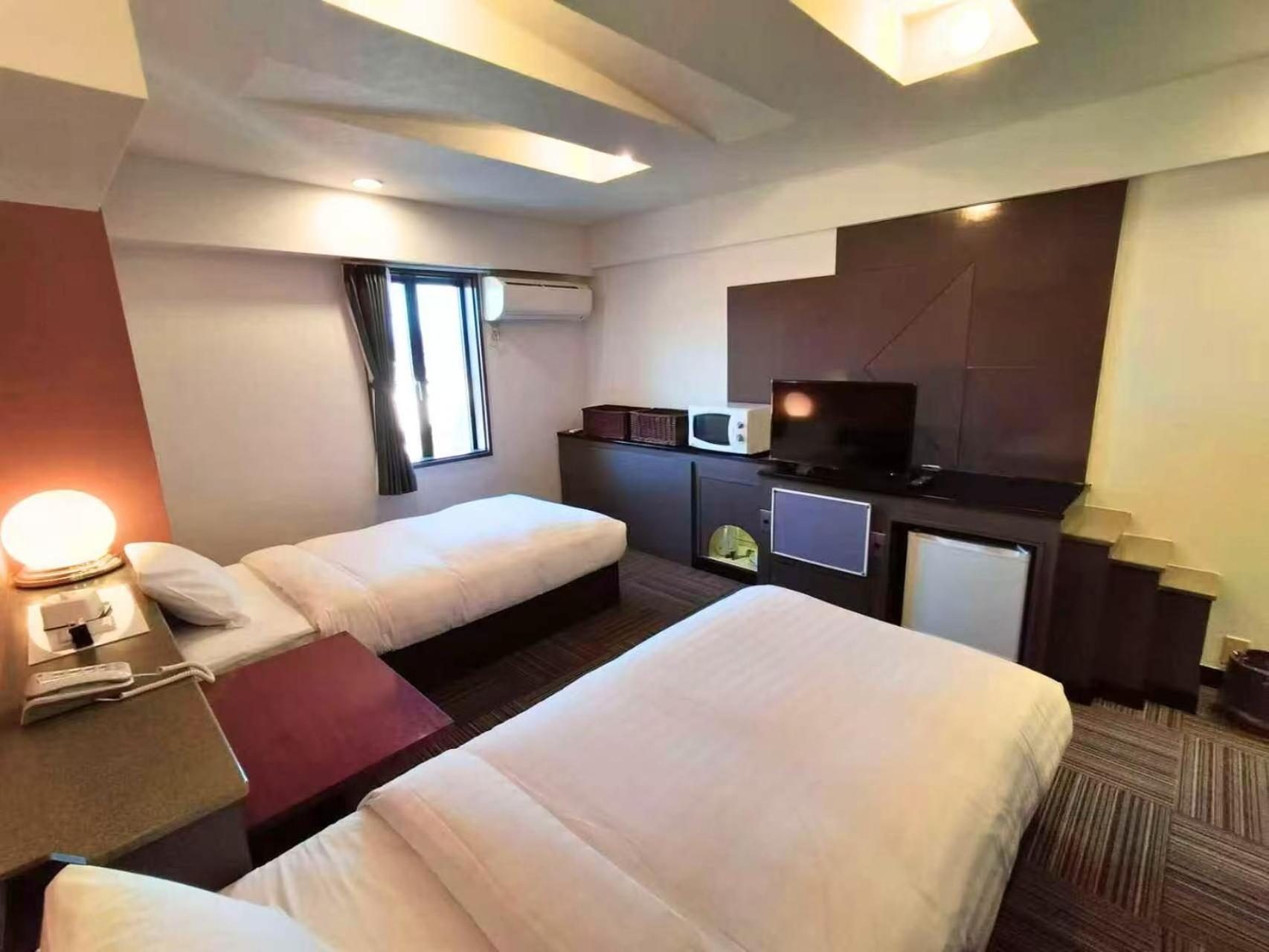 Twin Room - Photo 2