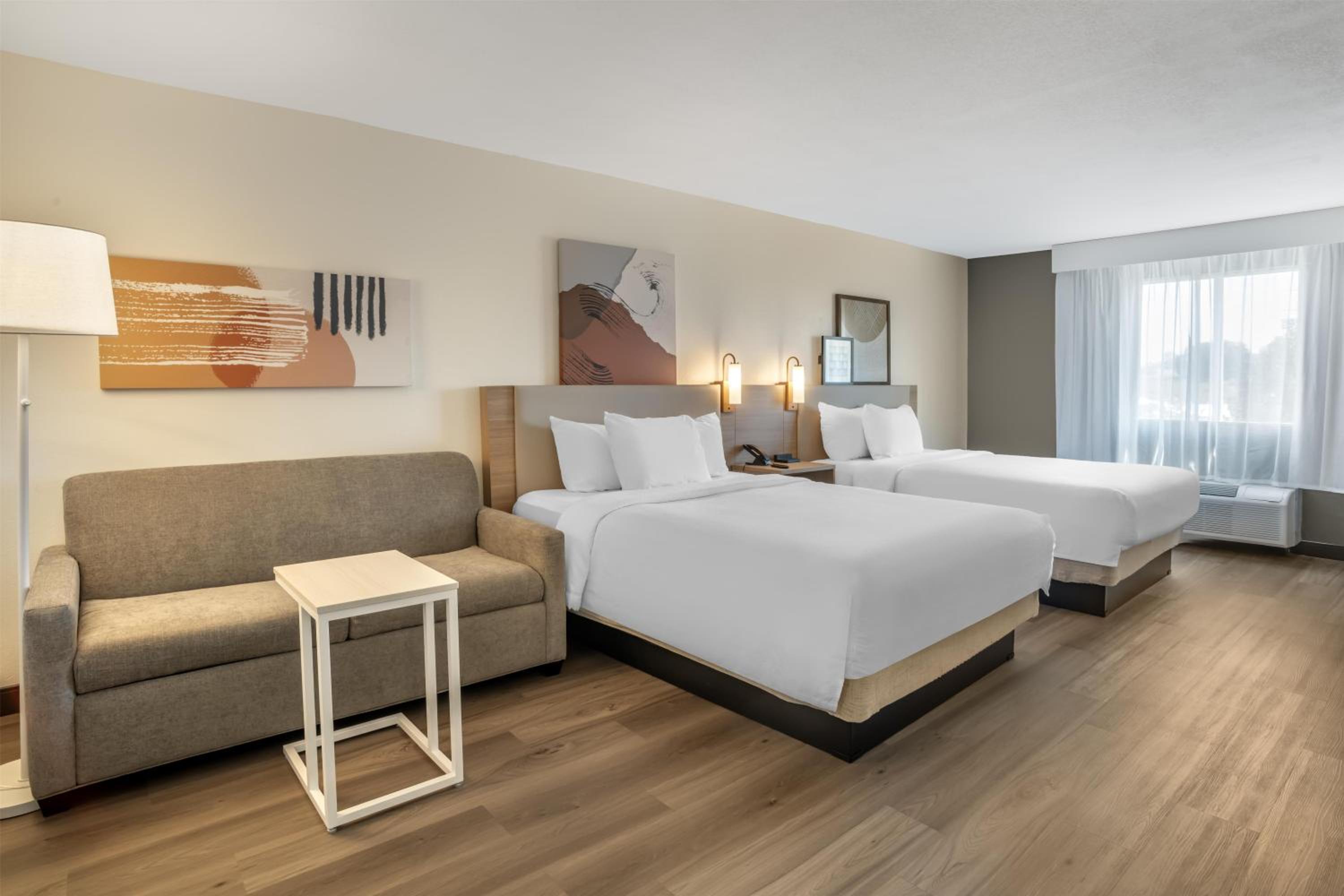 Queen Room with Two Queen Beds and Sofa Bed photo 1