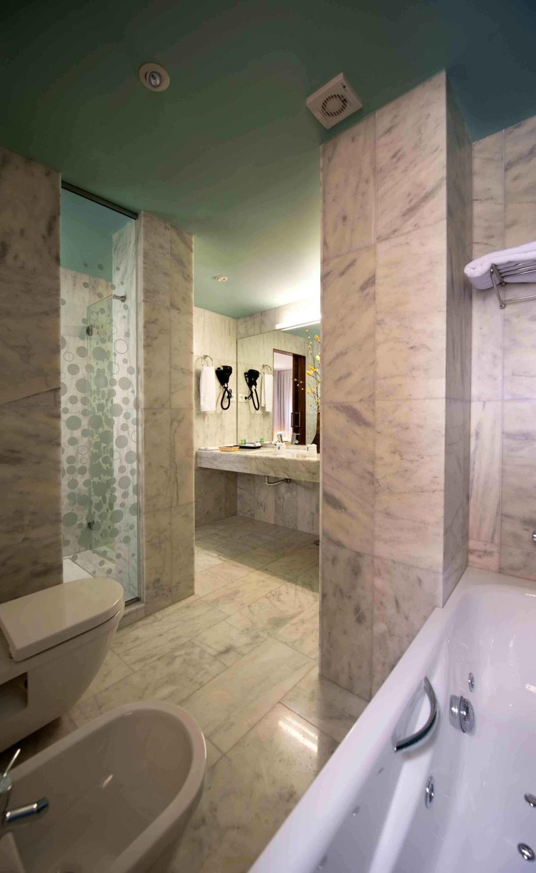 Habitación Deluxe Doble o con Dos Camas con Bañera de Hidromasaje Habitación Deluxe Doble o con Dos Camas con Bañera de Hidromasaje