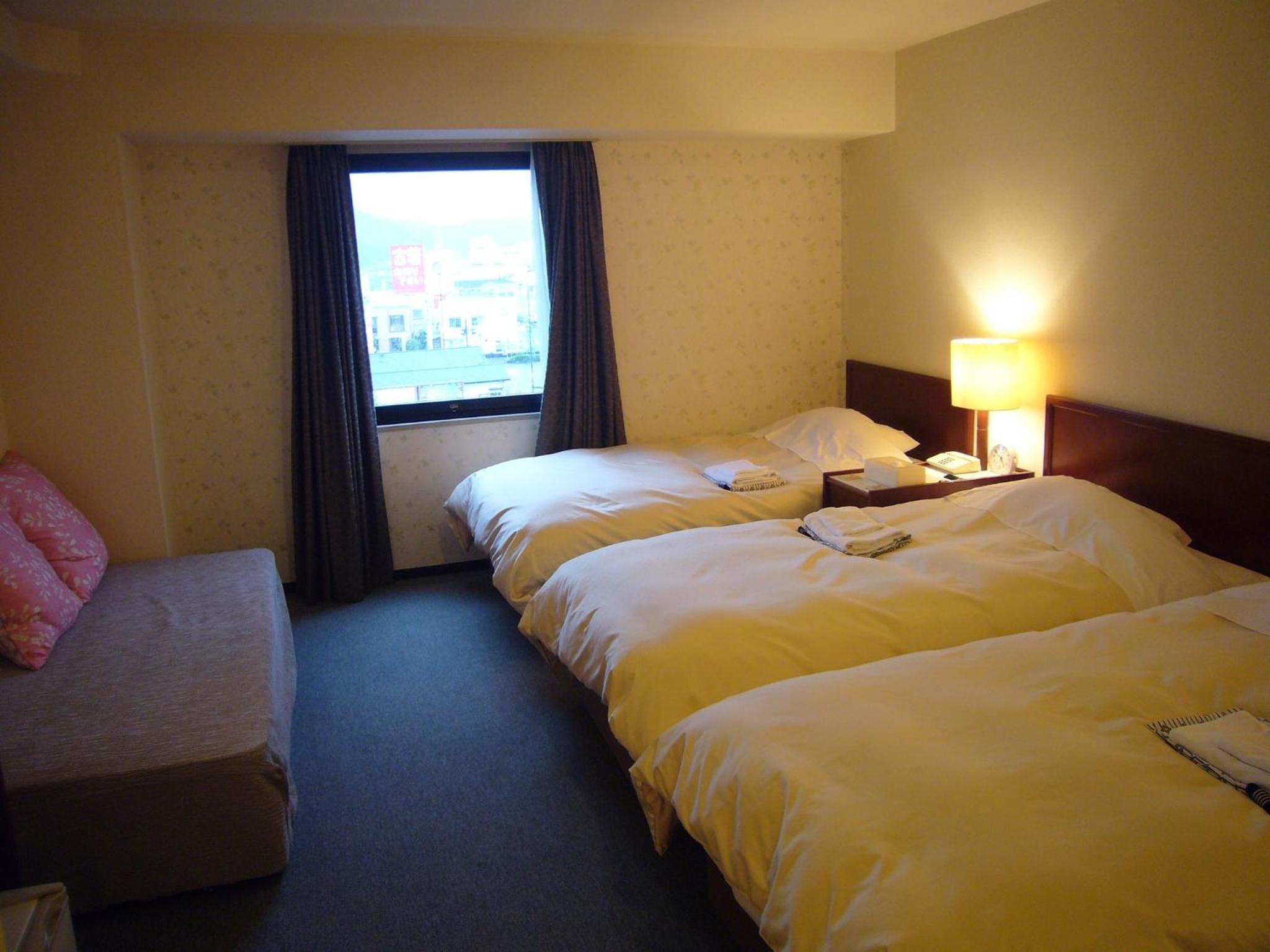 Triple Room with Sofa Bed - Non-Smoking photo 1