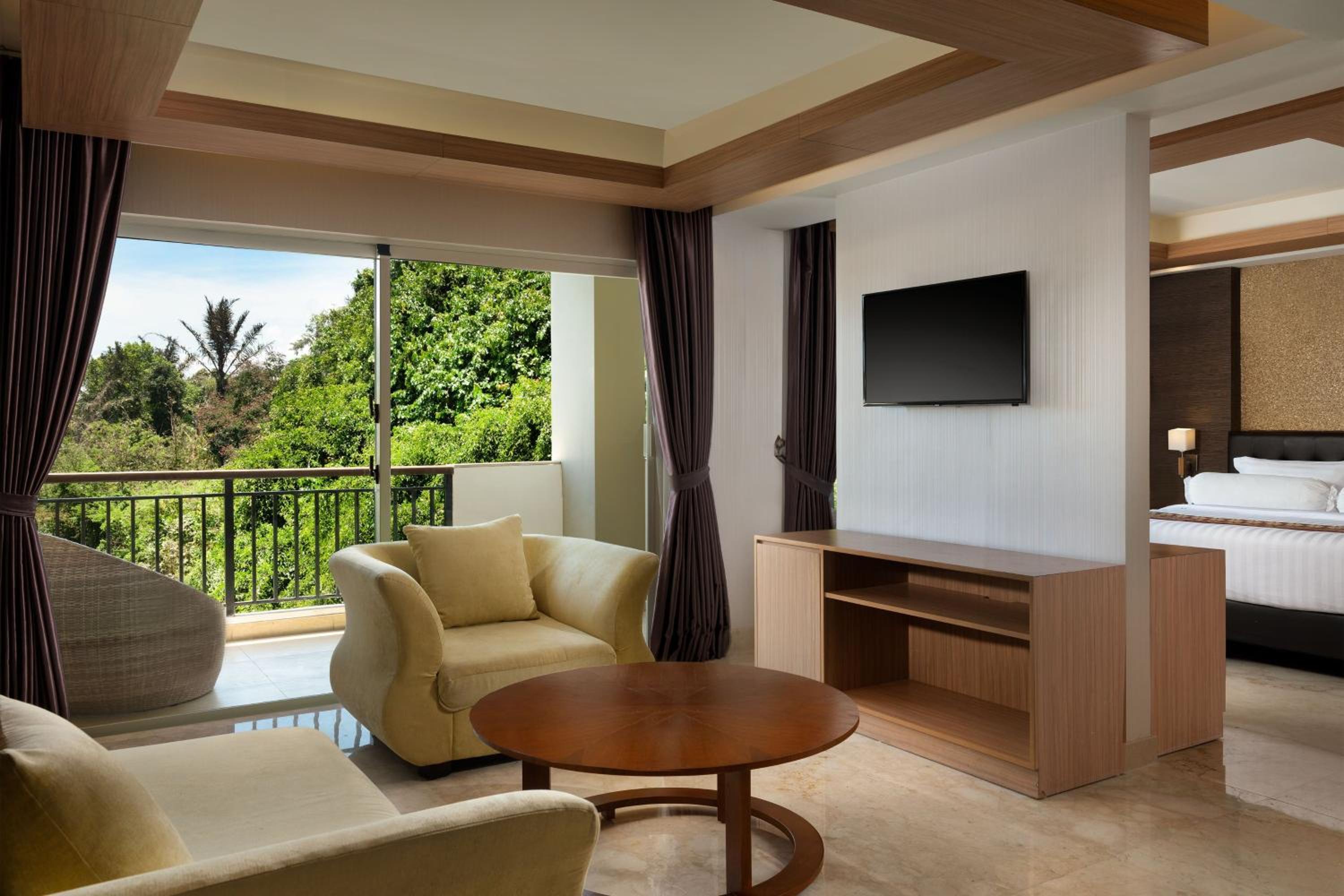 Jungle Suite Room with Balcony, River View, with FREE daily shuttle to Ubud City, FREE Photo Session, FREE Art Gallery Visit, 24-hour access to Fitness Center, FREE Welcome Drink, and FREE Kids Activities. photo 2