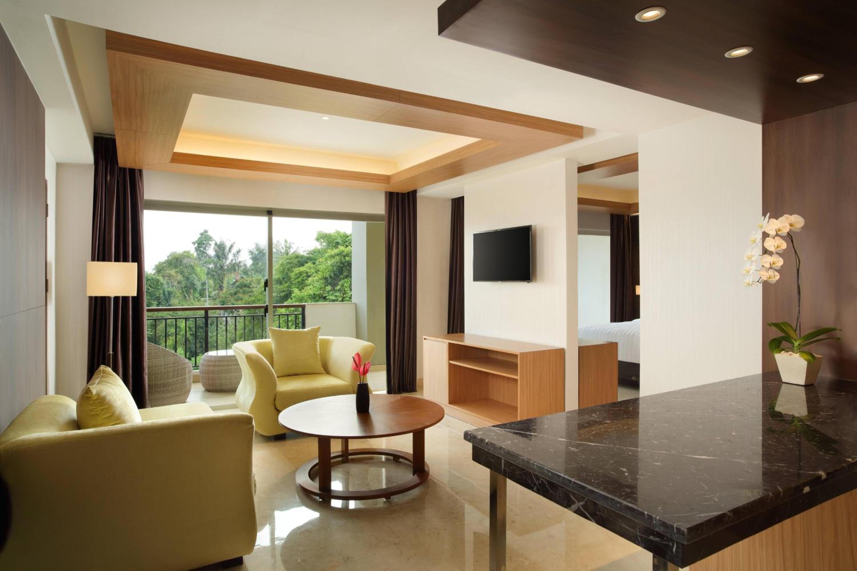 Jungle Suite Room with Balcony, River View, with FREE daily shuttle to Ubud City, FREE Photo Session, FREE Art Gallery Visit, 24-hour access to Fitness Center, FREE Welcome Drink, and FREE Kids Activities. photo 3